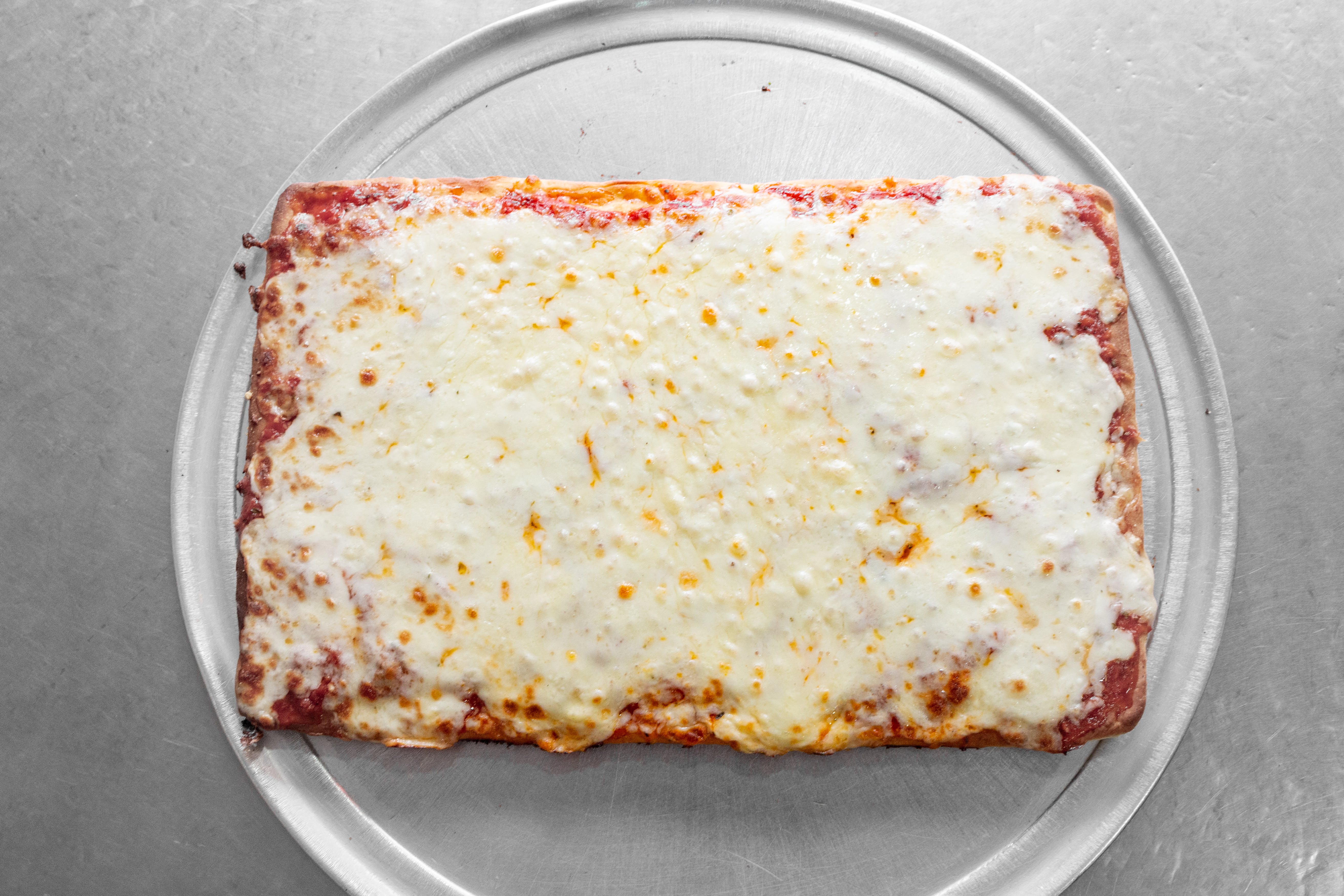 Order Square Pizza - Large food online from Not Ray Pizza store, Brooklyn on bringmethat.com