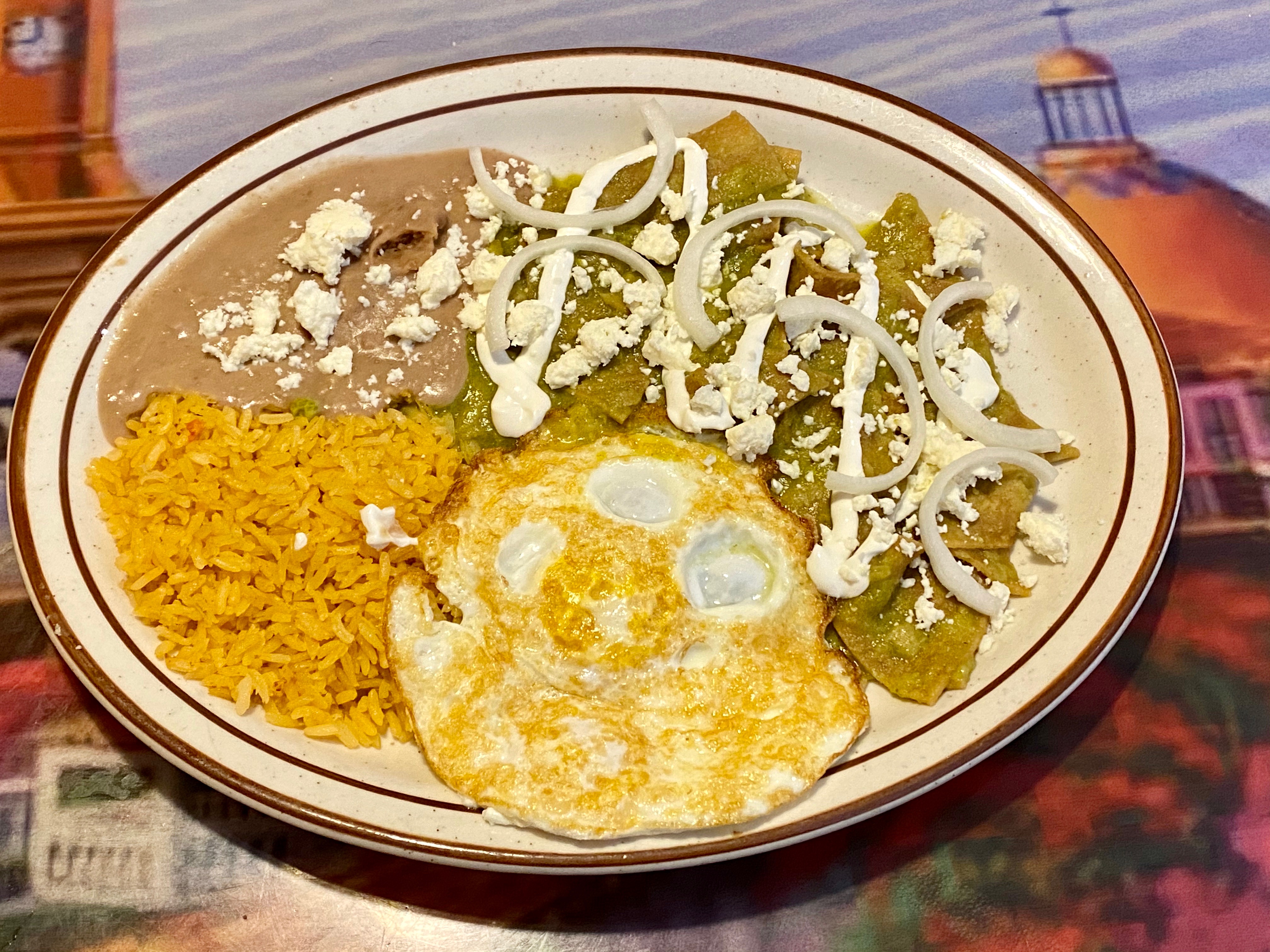 Order 83. Spicy Chilaquiles food online from El Tapatio Mexican Restaurant store, Wilmington on bringmethat.com