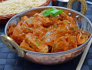 Order Tikka Masala food online from India Garden Restaurant store, Blacksburg on bringmethat.com