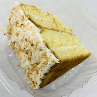 Order Coconut Cake food online from Baumgart's Cafe store, Edgewater on bringmethat.com