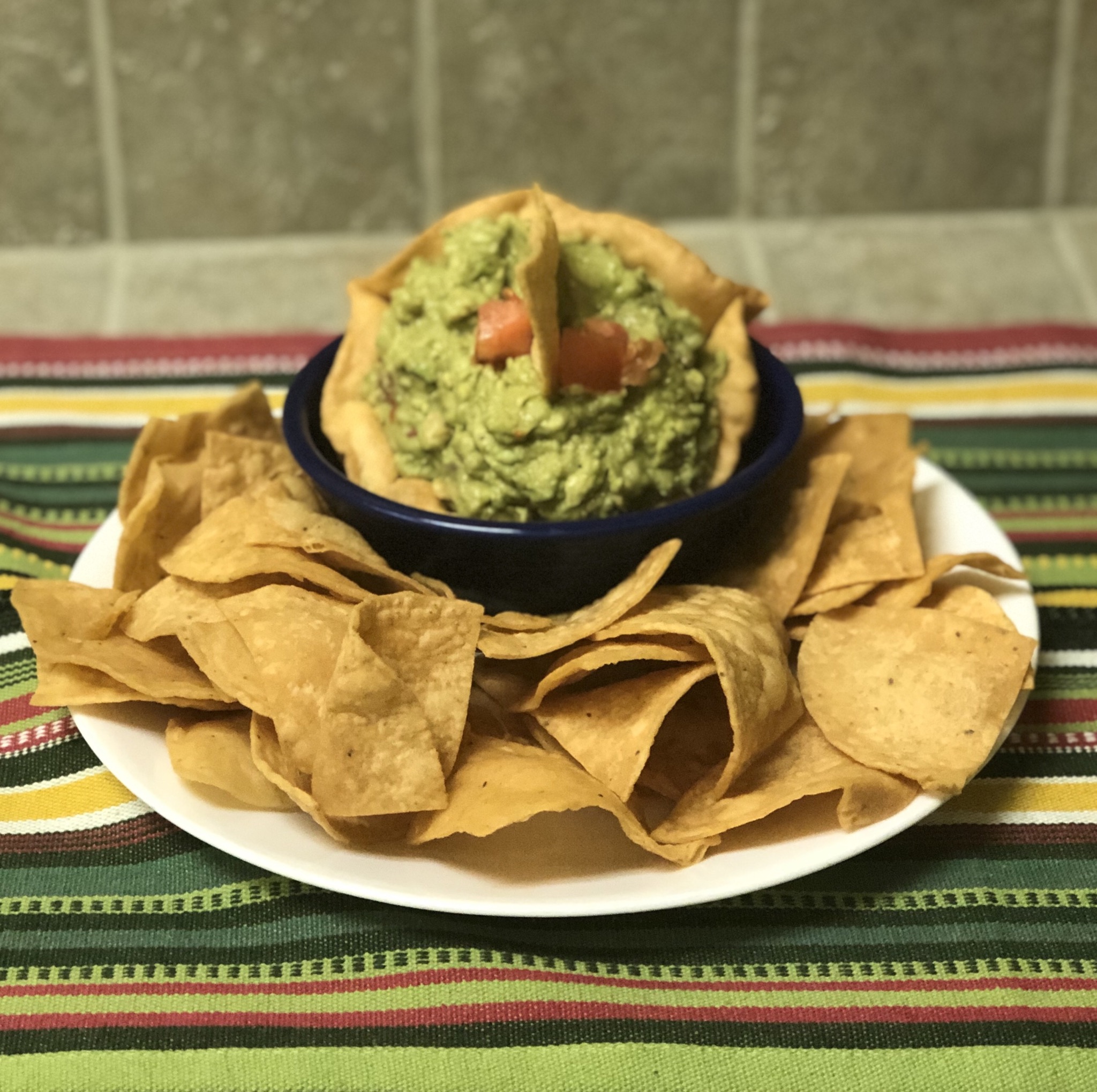 Order Guacamole Dip and Chips food online from Trini Mexican Carry Out store, New Baltimore on bringmethat.com