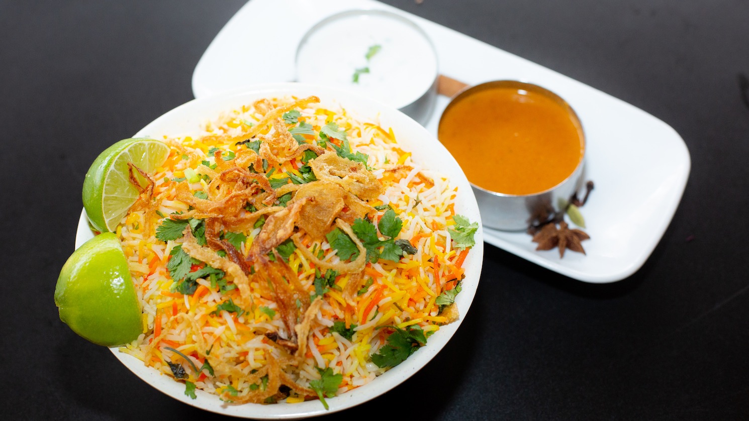 Order Goat Biryani food online from Masala Desi Cafe store, Burlingame on bringmethat.com