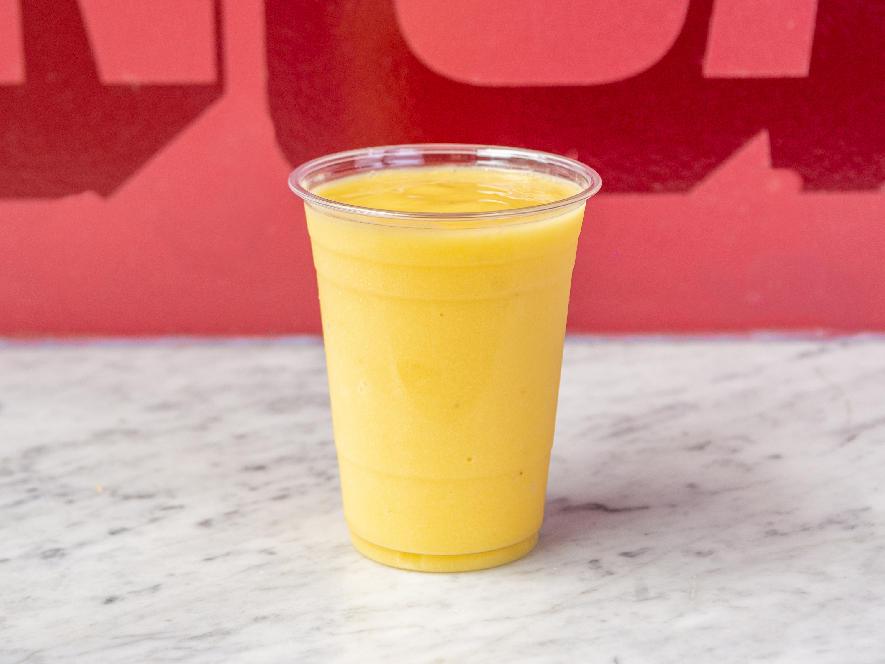 Order S7. Pineapple, Mango and Banana with Peach Nectar Smoothie food online from Cusp, Crepe And Espresso Bar store, Kings on bringmethat.com