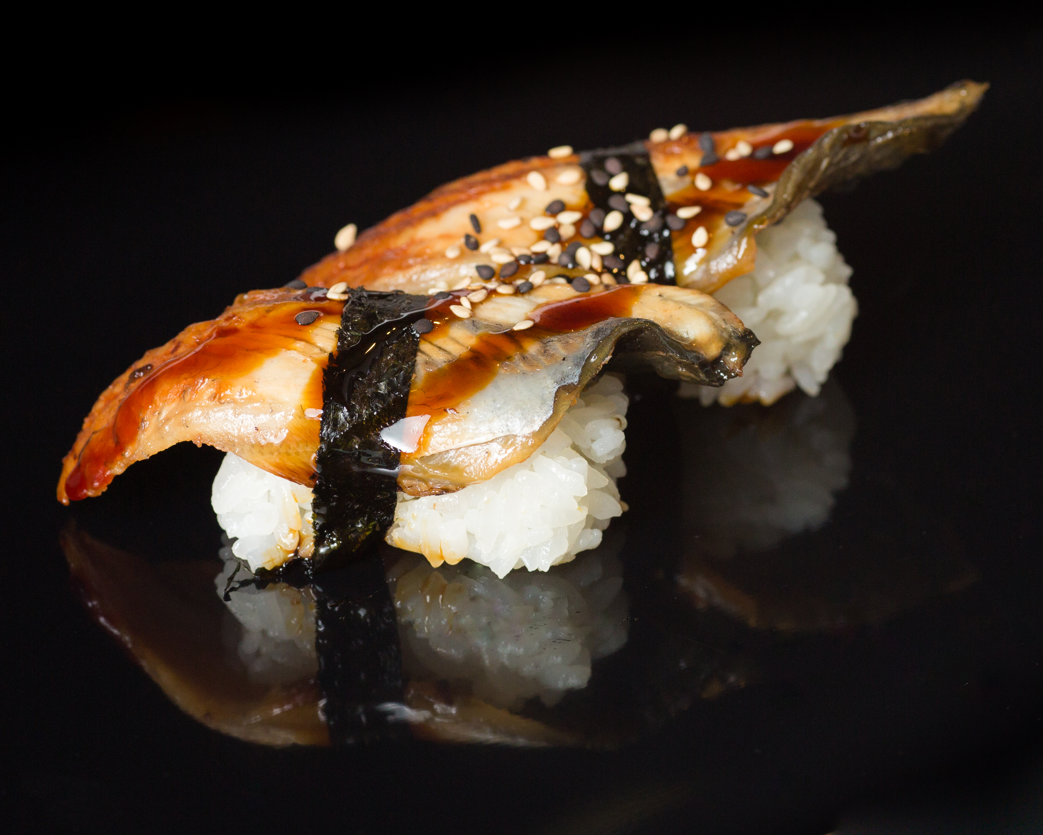Order 2 Pieces Eel food online from Sushi Sakura Express store, Houston on bringmethat.com