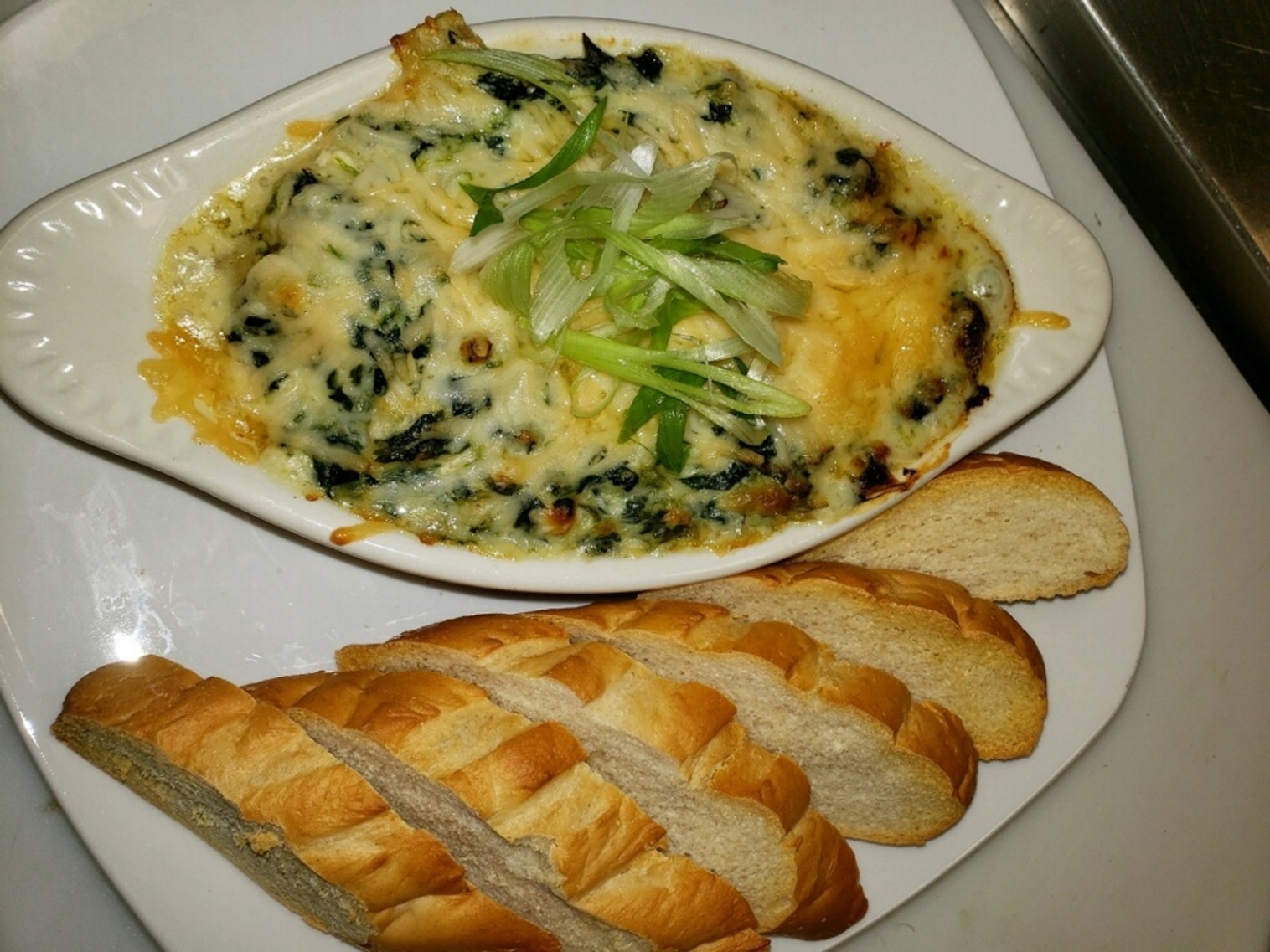 Order Spinach Artichoke Dip food online from Neil St Blues store, Champaign on bringmethat.com