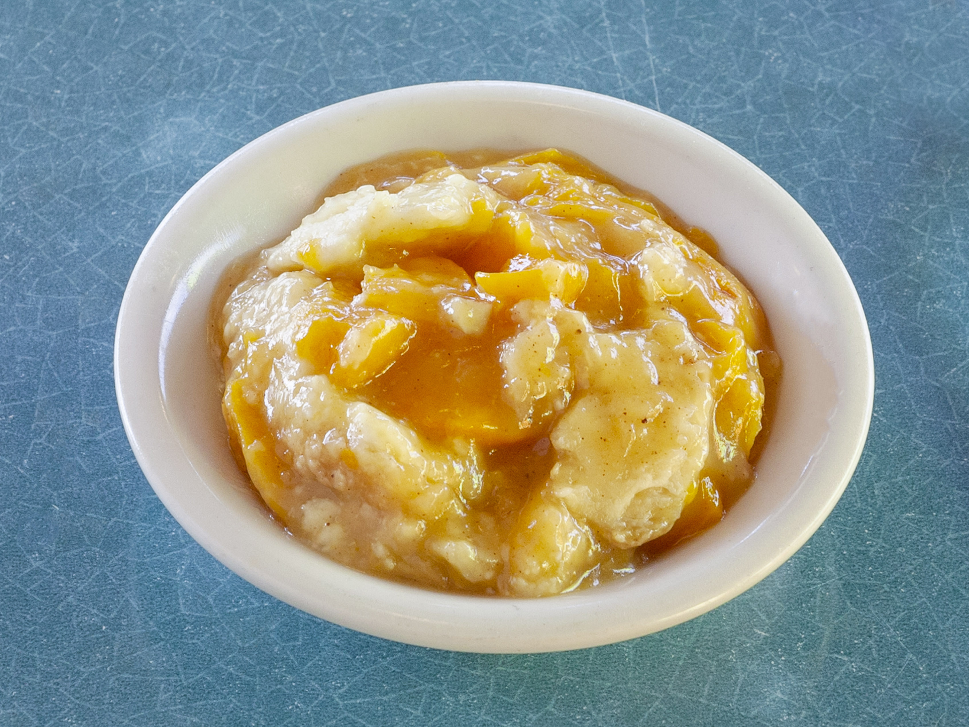 Order Peach Cobbler food online from In And Out Soul Food store, Baton Rouge on bringmethat.com