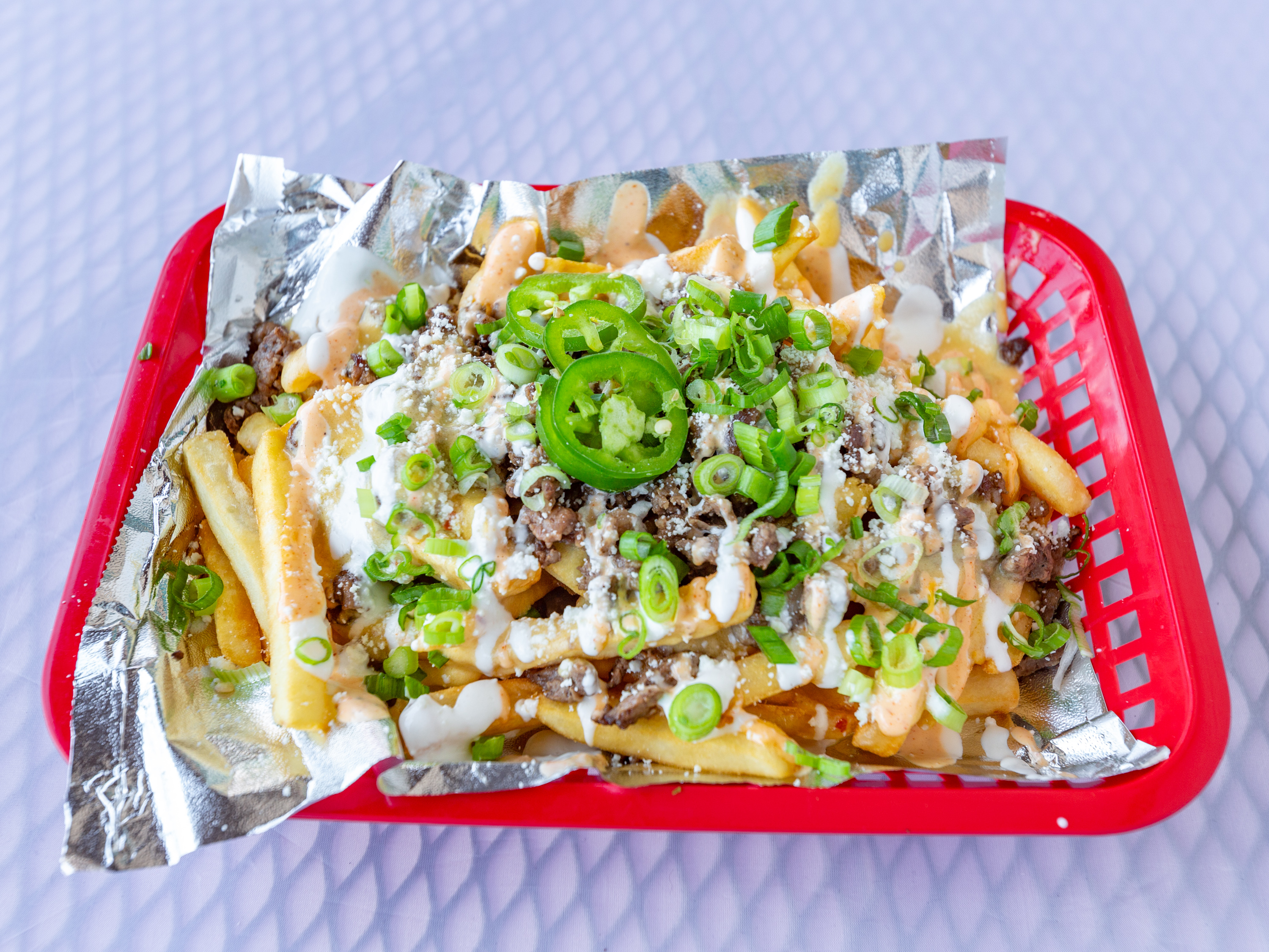Order Birria Fries food online from Rollies Mexican Patio store, Tucson on bringmethat.com