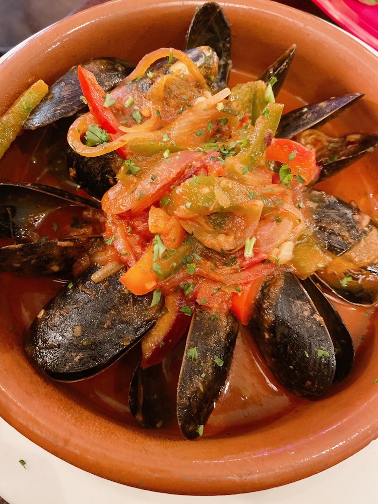 Order Sofrito Steamed Mussels food online from Madera Cuban Grill store, Long Island City on bringmethat.com