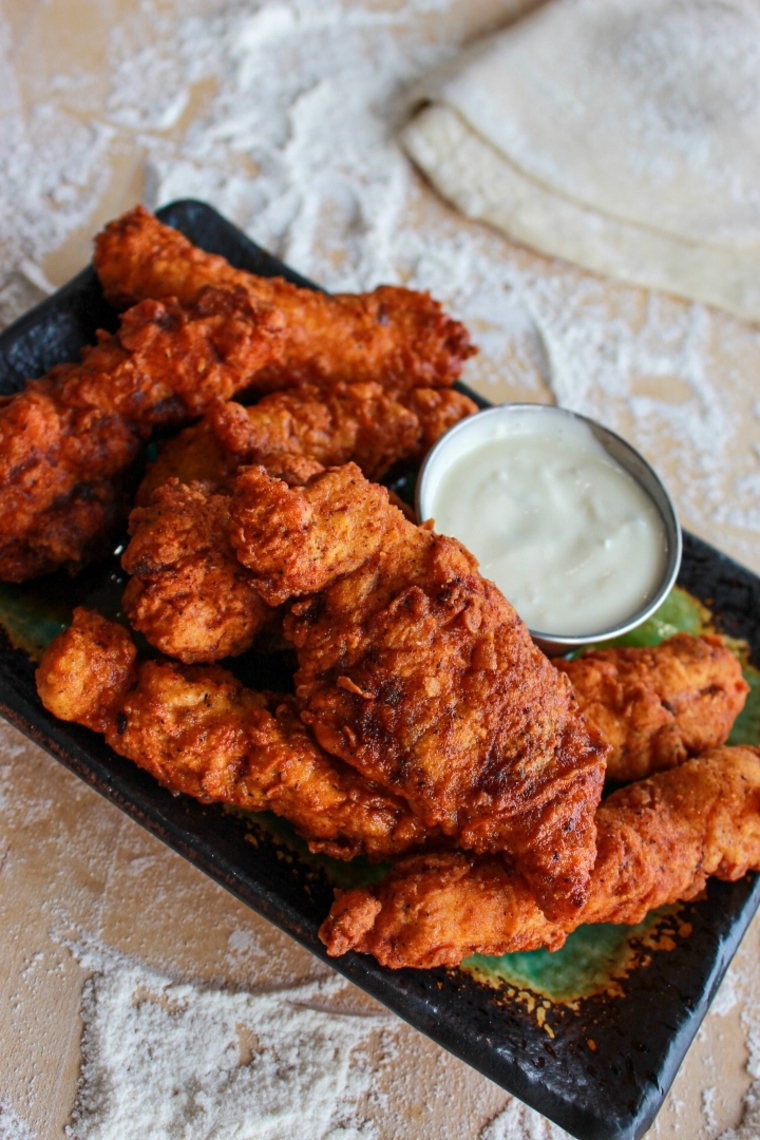 Order 4pc Nashville Hot Chicken Tenders food online from The Upper Crust Pizzeria store, Brookline on bringmethat.com