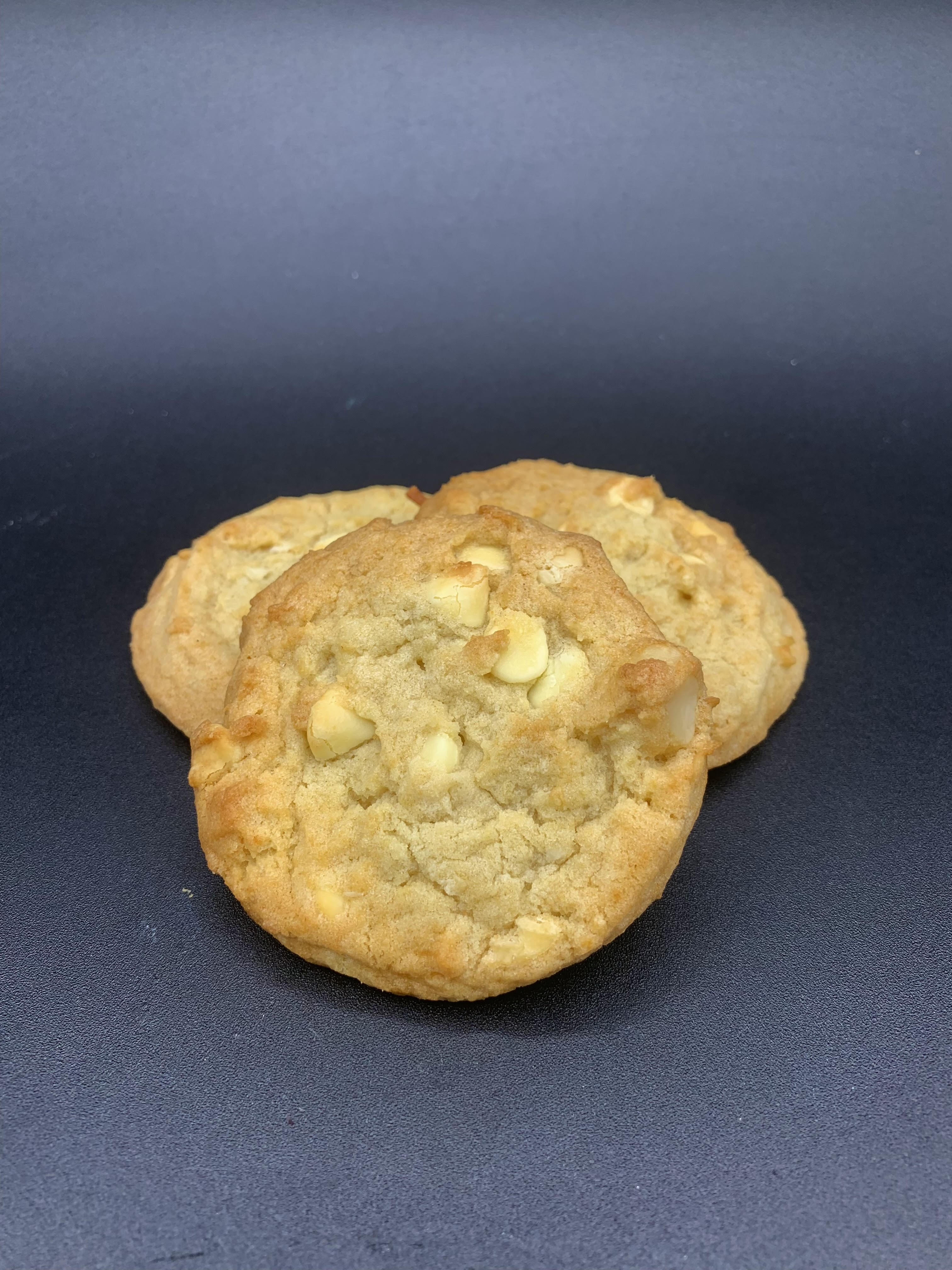 Order White Chocolate Macadamia Nut Cookie food online from Sweet Tooth store, Fayetteville on bringmethat.com