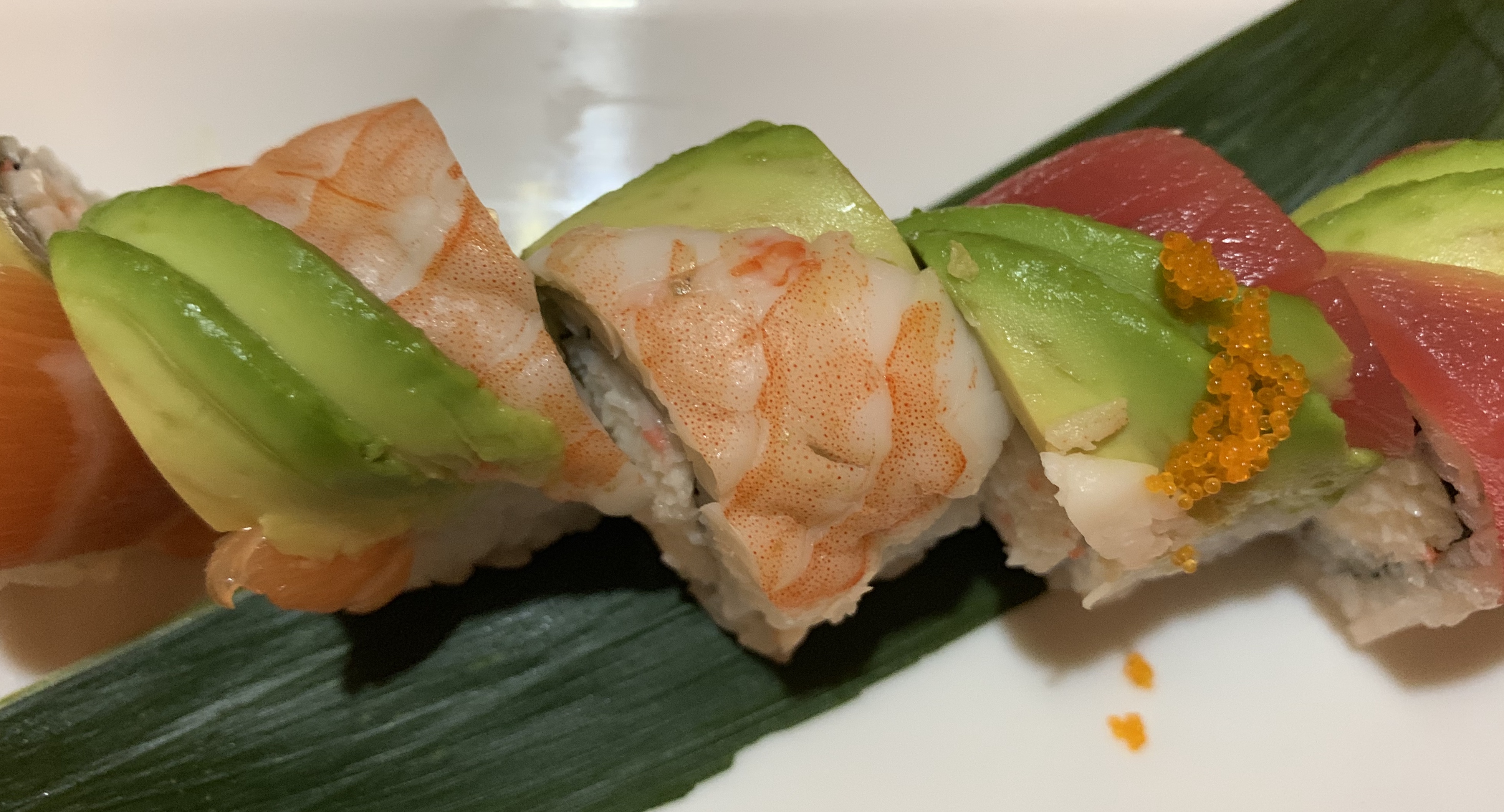 Order Rainbow Roll food online from Tomo7Sushi store, Riverside on bringmethat.com
