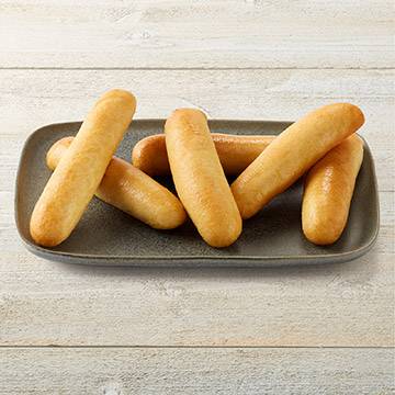 Order Basket of Breadsticks food online from Tgi Friday's store, Clifton Park on bringmethat.com