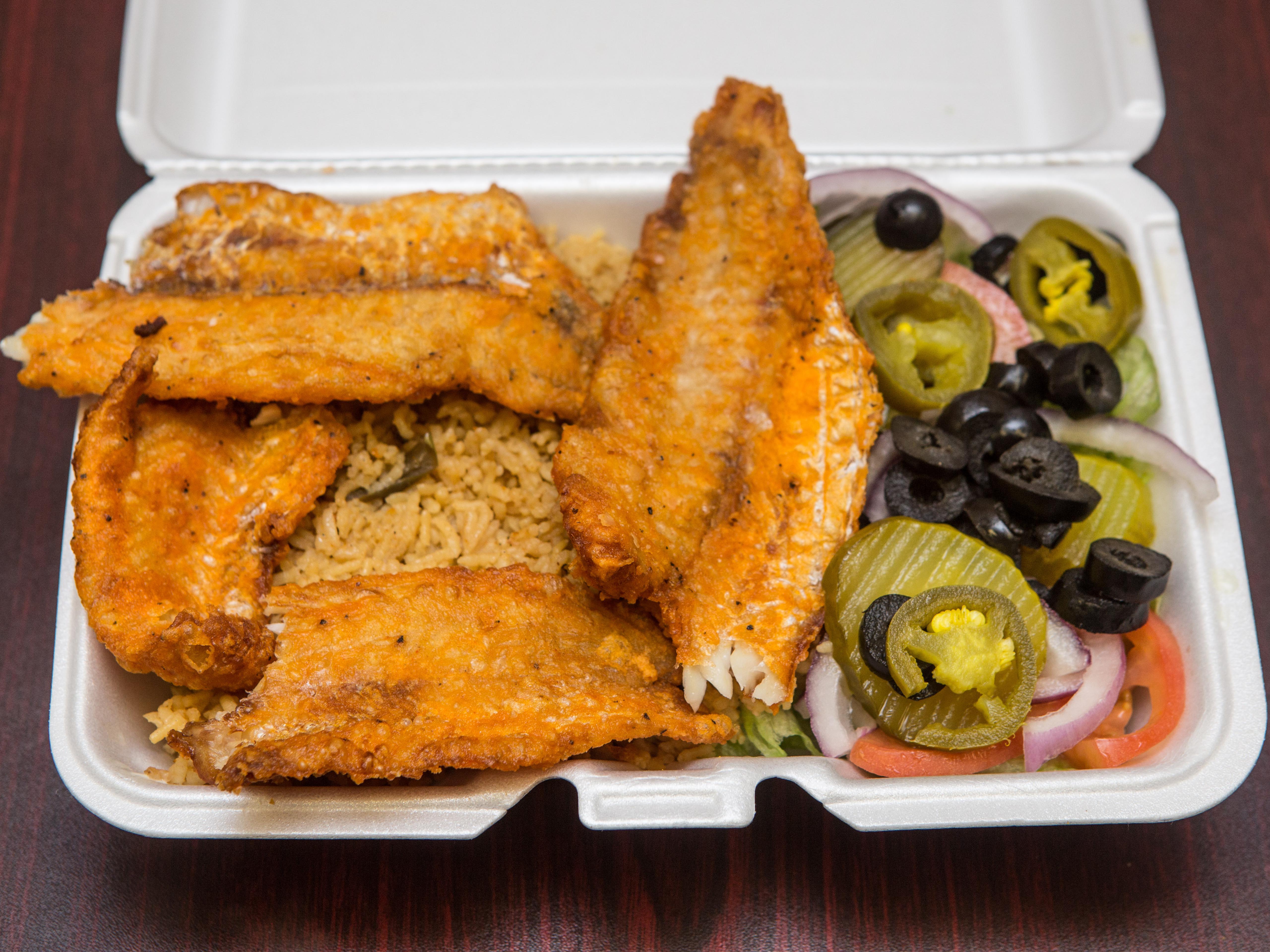 Order 2 Piece Whiting Fish with Rice and Salad food online from Rashel crown fried chicken store, brooklyn on bringmethat.com