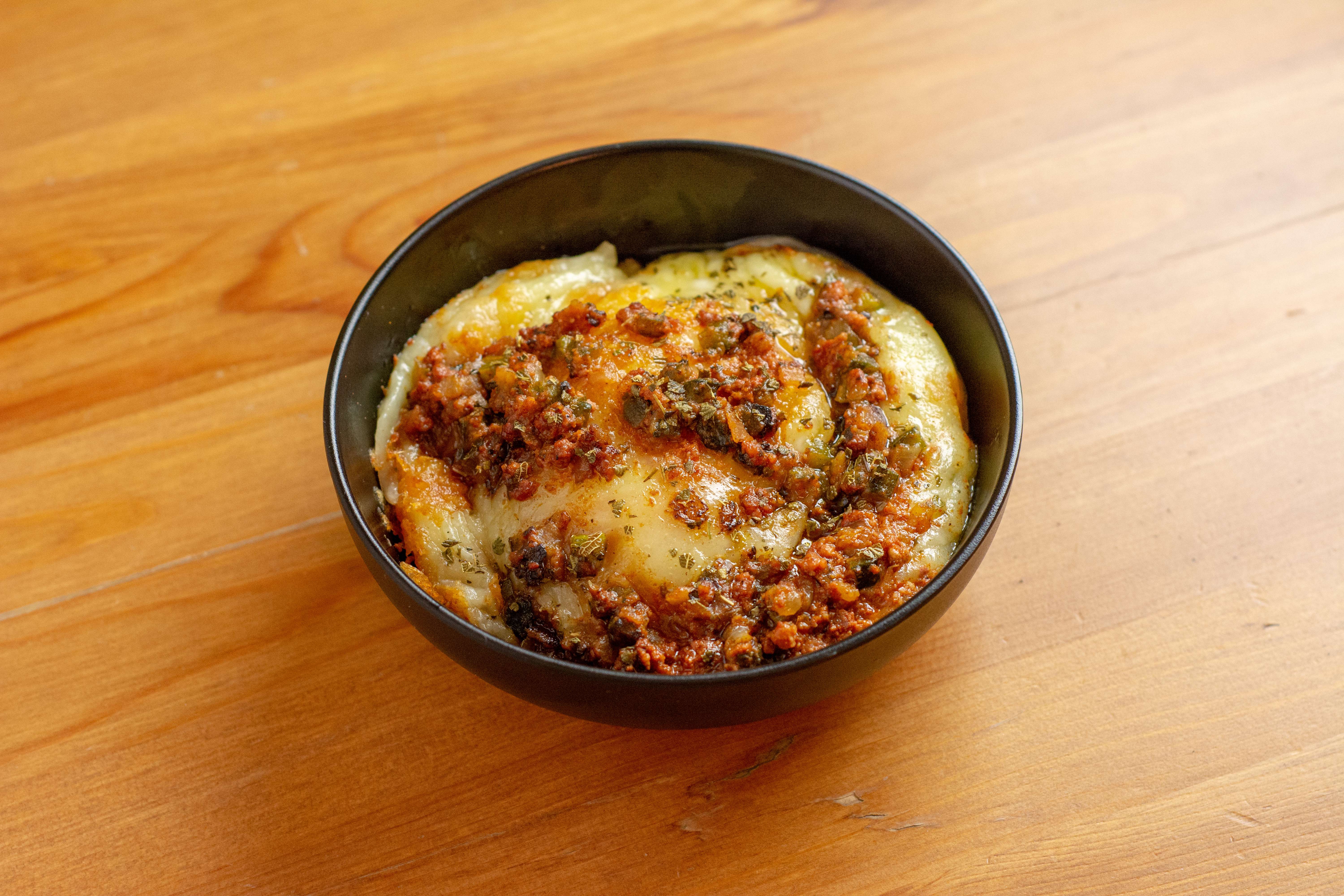 Order Queso Fundido food online from Red O Taste Of Mexico store, San Diego on bringmethat.com