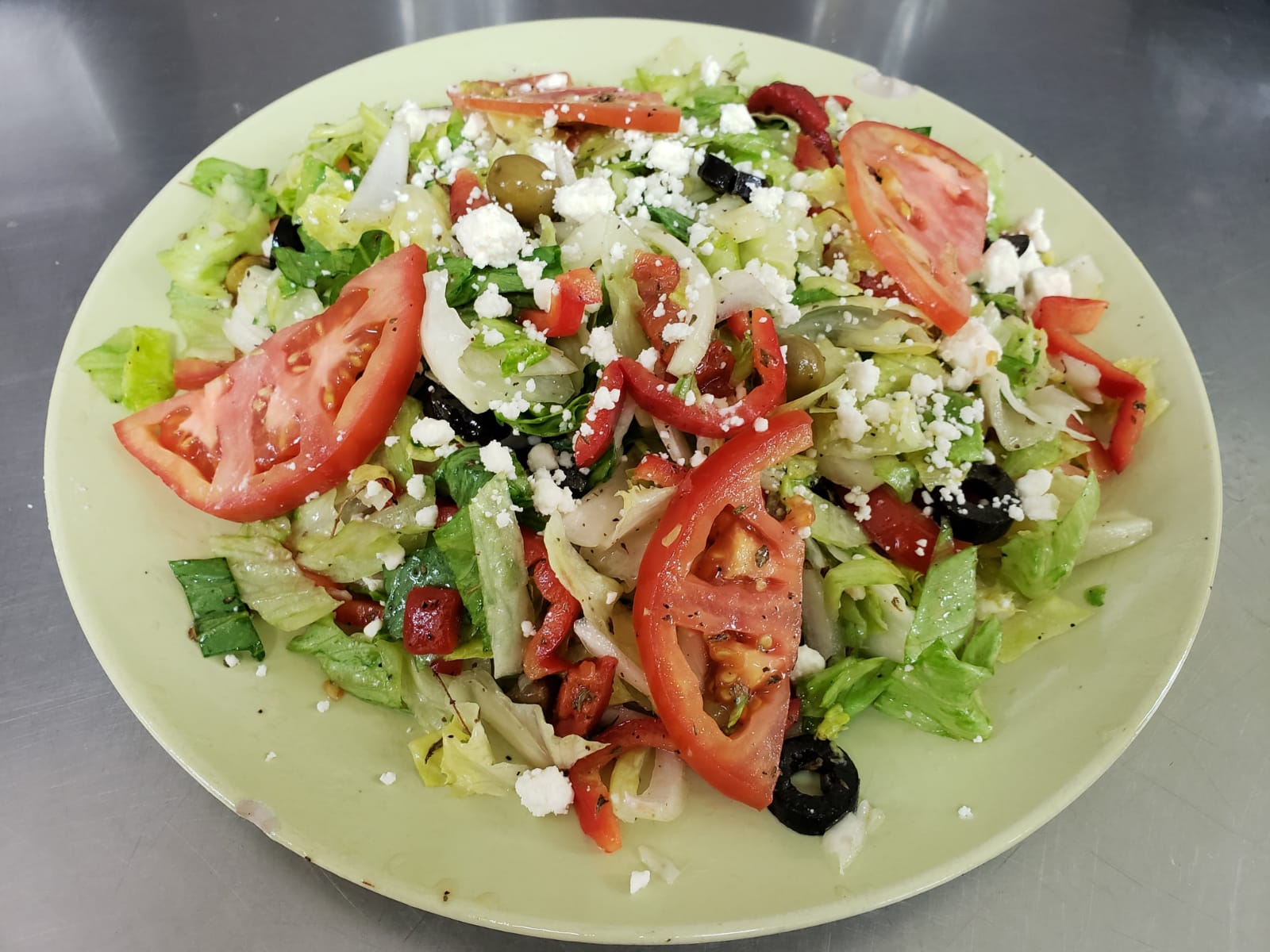 Order Greek salad food online from Aminas Cafe store, Bronx on bringmethat.com