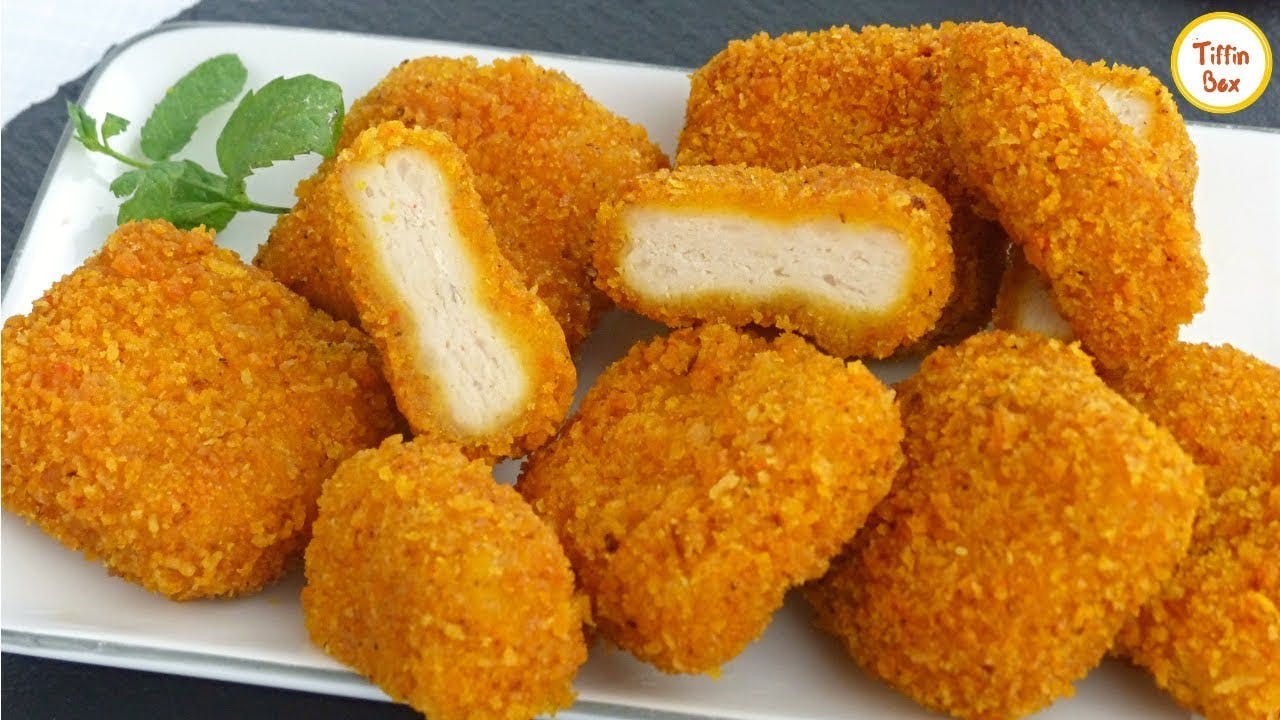 Order Chicken Nuggets - 10 Pieces food online from Little clown pizza & restaurant store, Chicago on bringmethat.com