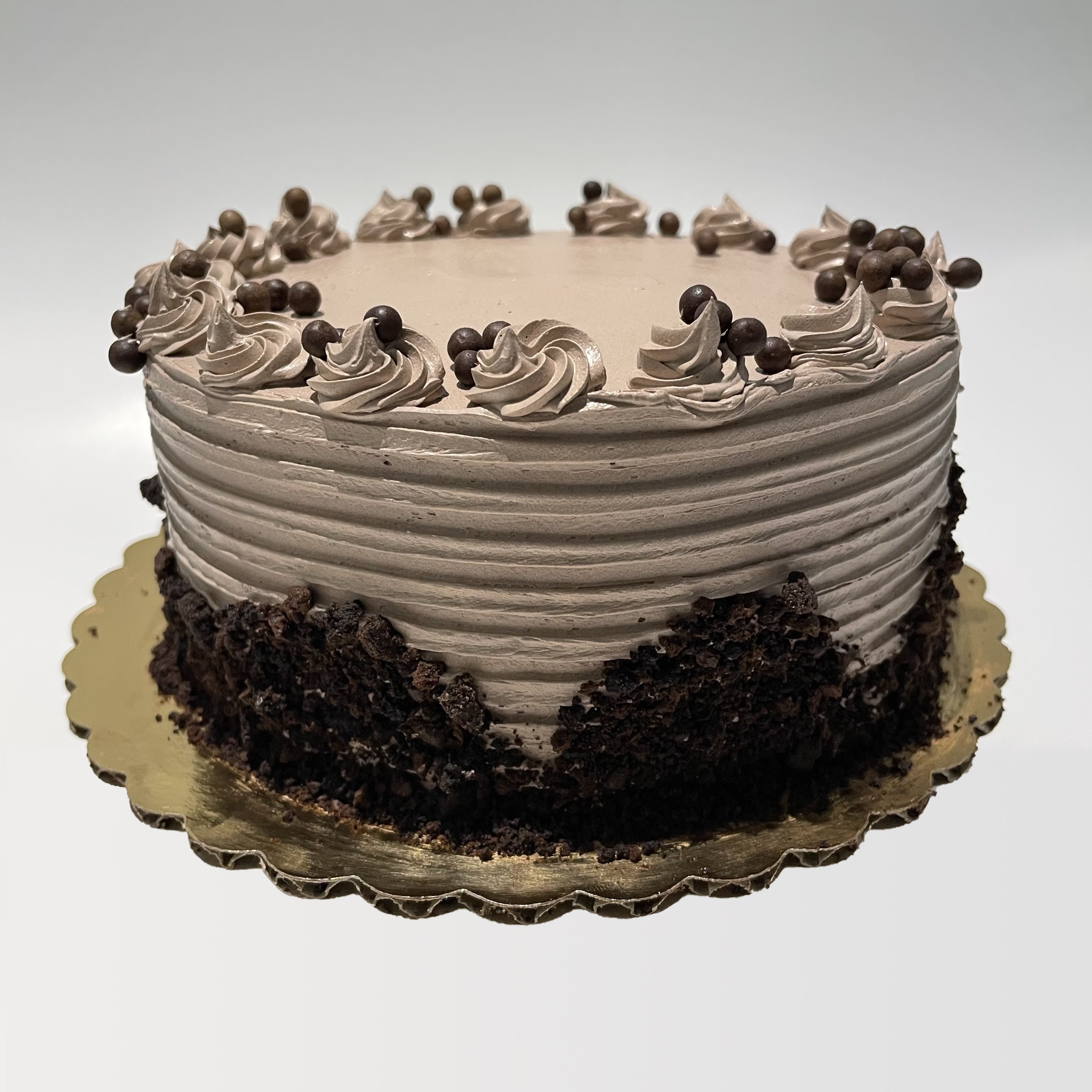 Order Chocolate Mousse Cake - 6 Inch food online from The House of Cupcakes store, Princeton on bringmethat.com