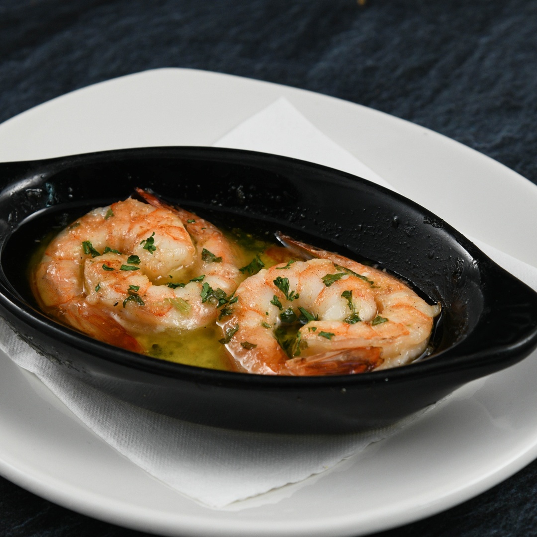 Order Add Shrimp Scampi food online from Rainforest Cafe store, Las Vegas on bringmethat.com