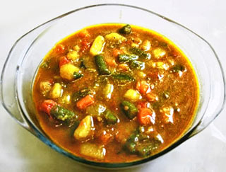 Order Vegetable Korma food online from India Garden Restaurant store, Blacksburg on bringmethat.com