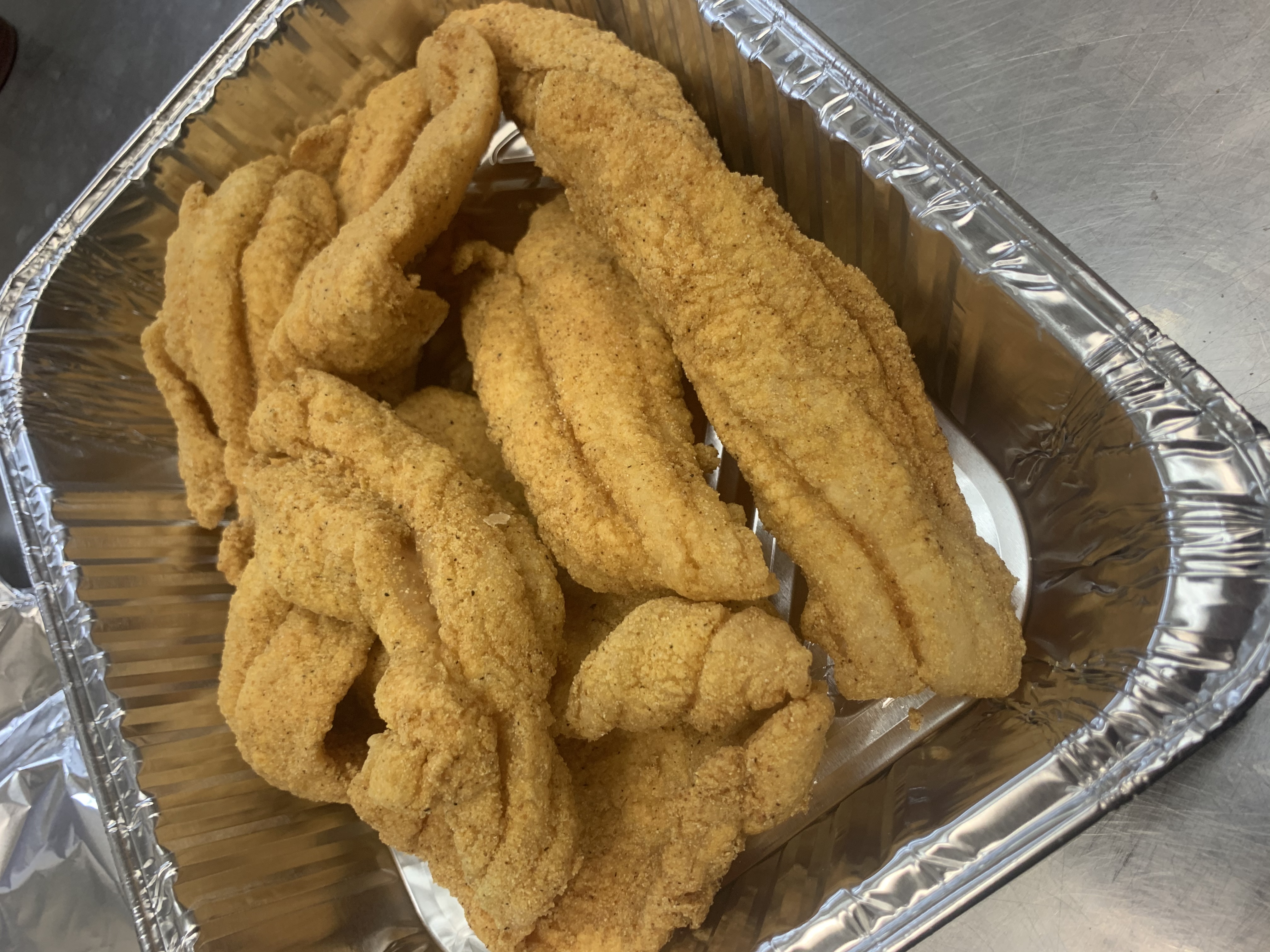 Order 12 Pieces Catfish Fillet food online from Jj Fish & Chicken store, Forest Park on bringmethat.com