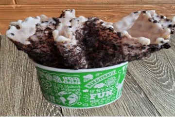 Order White Chocolate with Oreo’s Dipped Waffle Bowl food online from Ben & Jerry's store, Plano on bringmethat.com