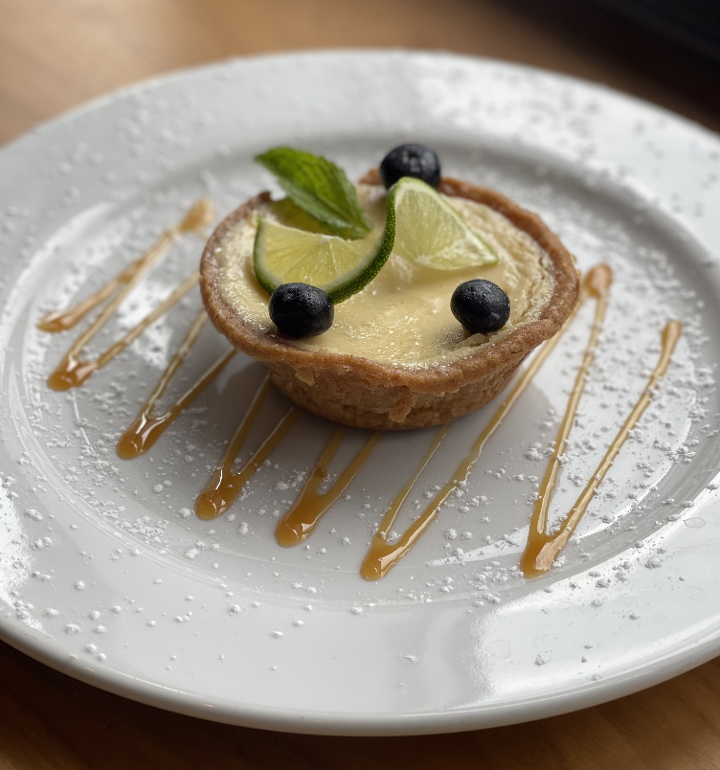 Order Mini Key Lime Pie food online from Busboys and Poets store, Hyattsville on bringmethat.com