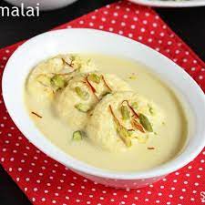 Order Rasmalai(3) food online from Cosmo Indian Cafe store, Lawrence on bringmethat.com