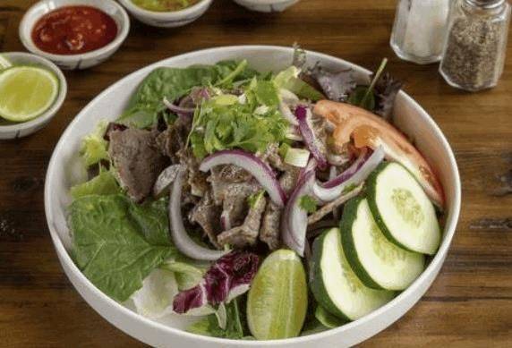 Order Spicy Steak Salad food online from Coconut Cafe store, Newton Centre on bringmethat.com