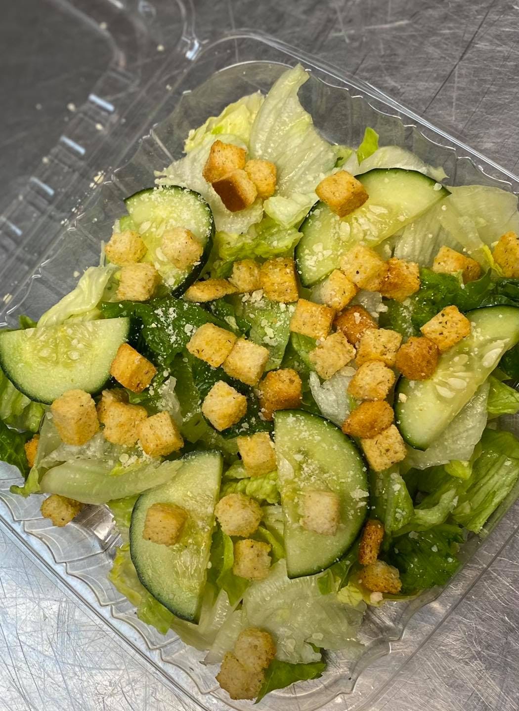 Order Caesar Salad - Small food online from Henriquez Pizza store, Denton on bringmethat.com
