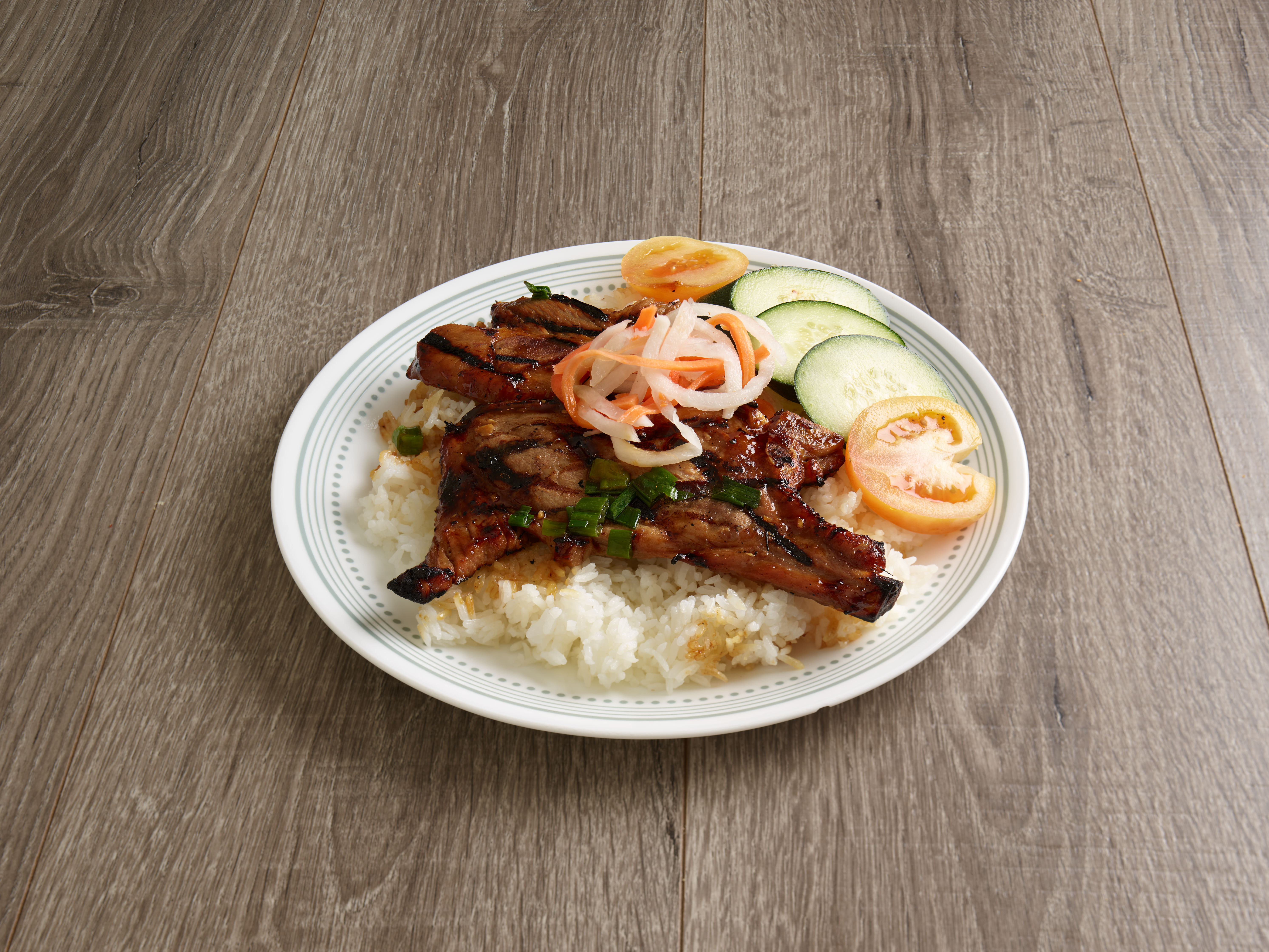 Order 32. Grilled Pork Rice Platters / Com Suon Nuong food online from Pho Little Saigon store, Taylorsville on bringmethat.com