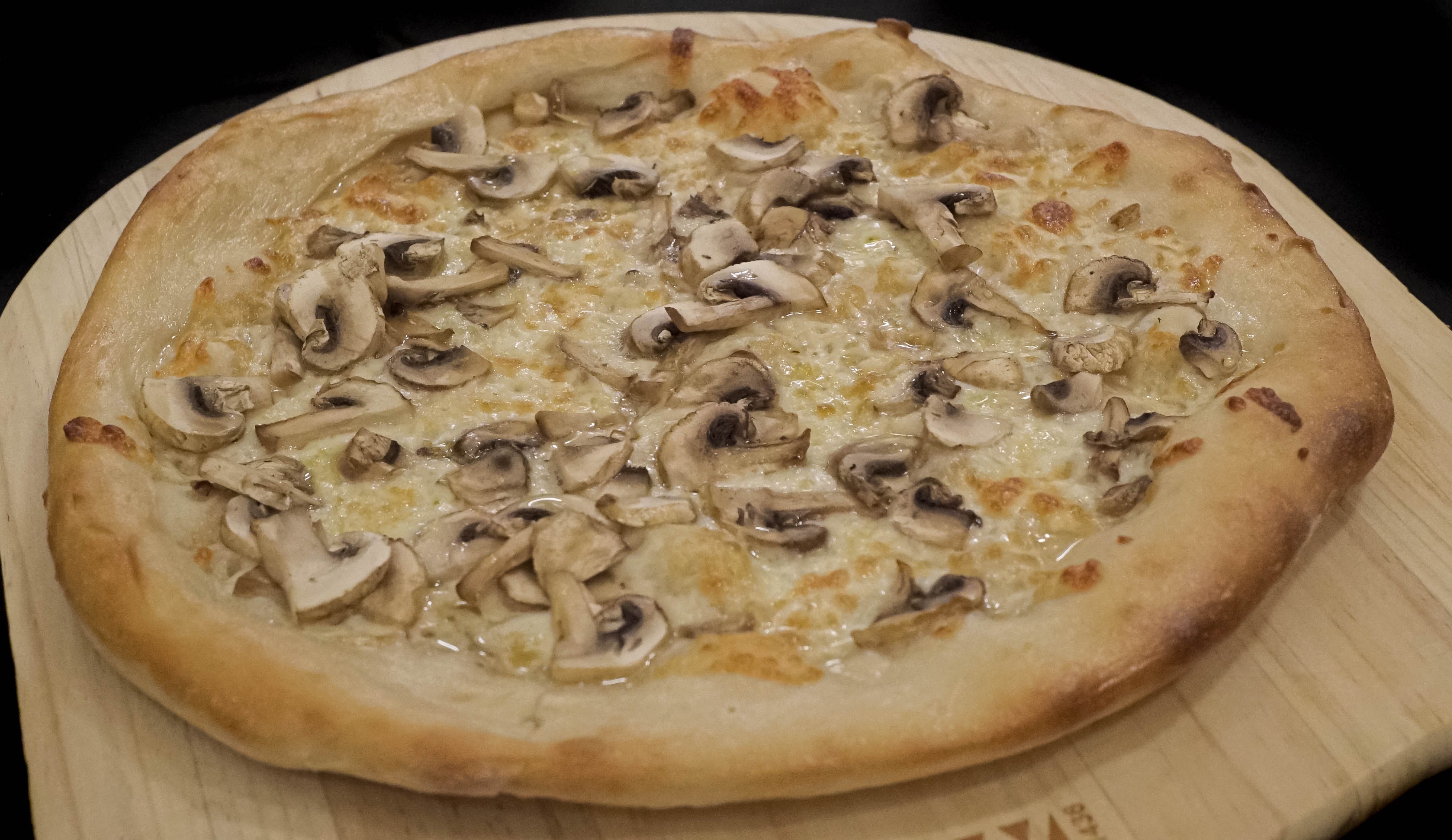 Order Truffle Mushroom Pizza - Small food online from Buongiorno Pizza E Pasta store, Los Angeles on bringmethat.com