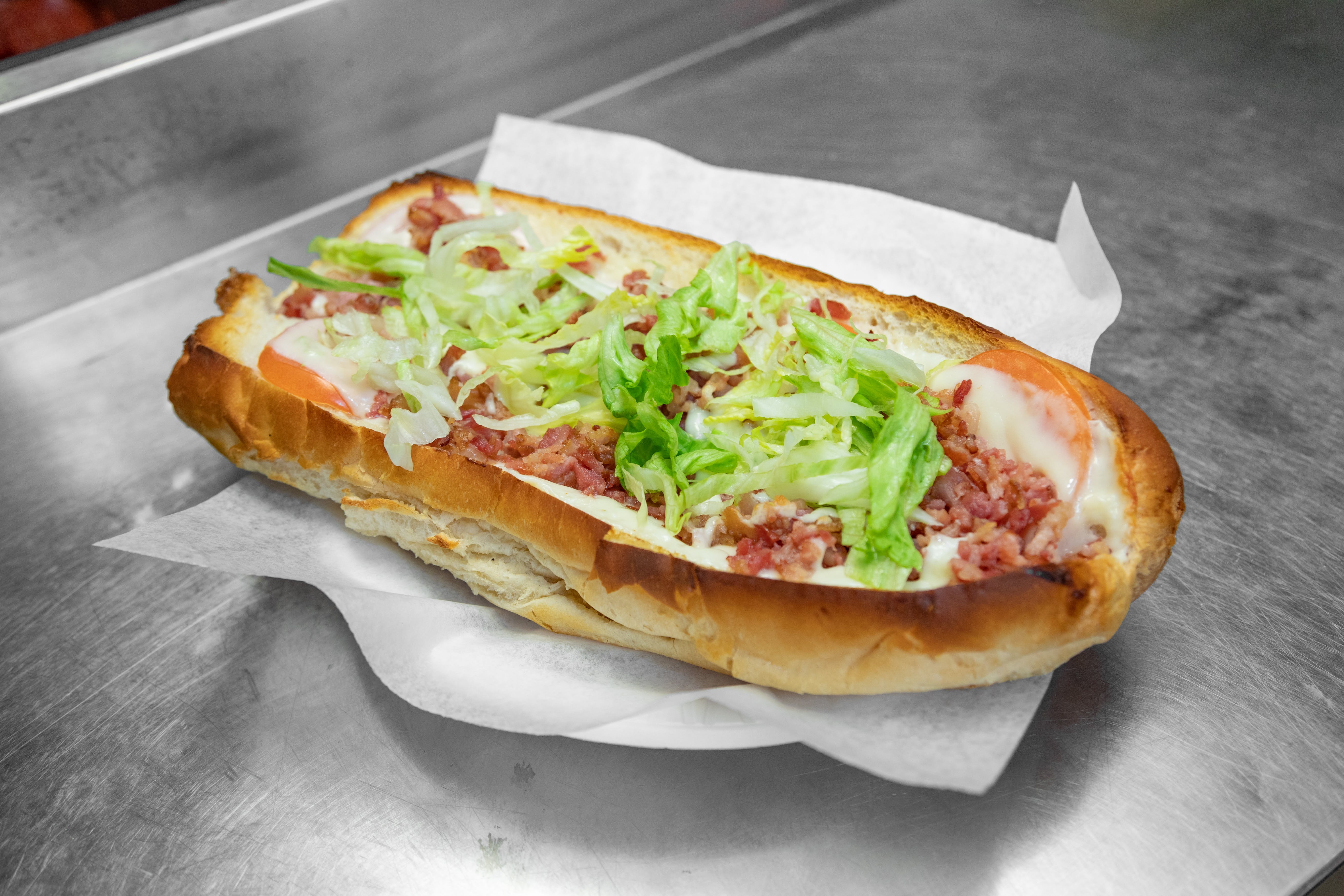 Order BLT Grinder - Half food online from Campus Pizza store, Hartford on bringmethat.com