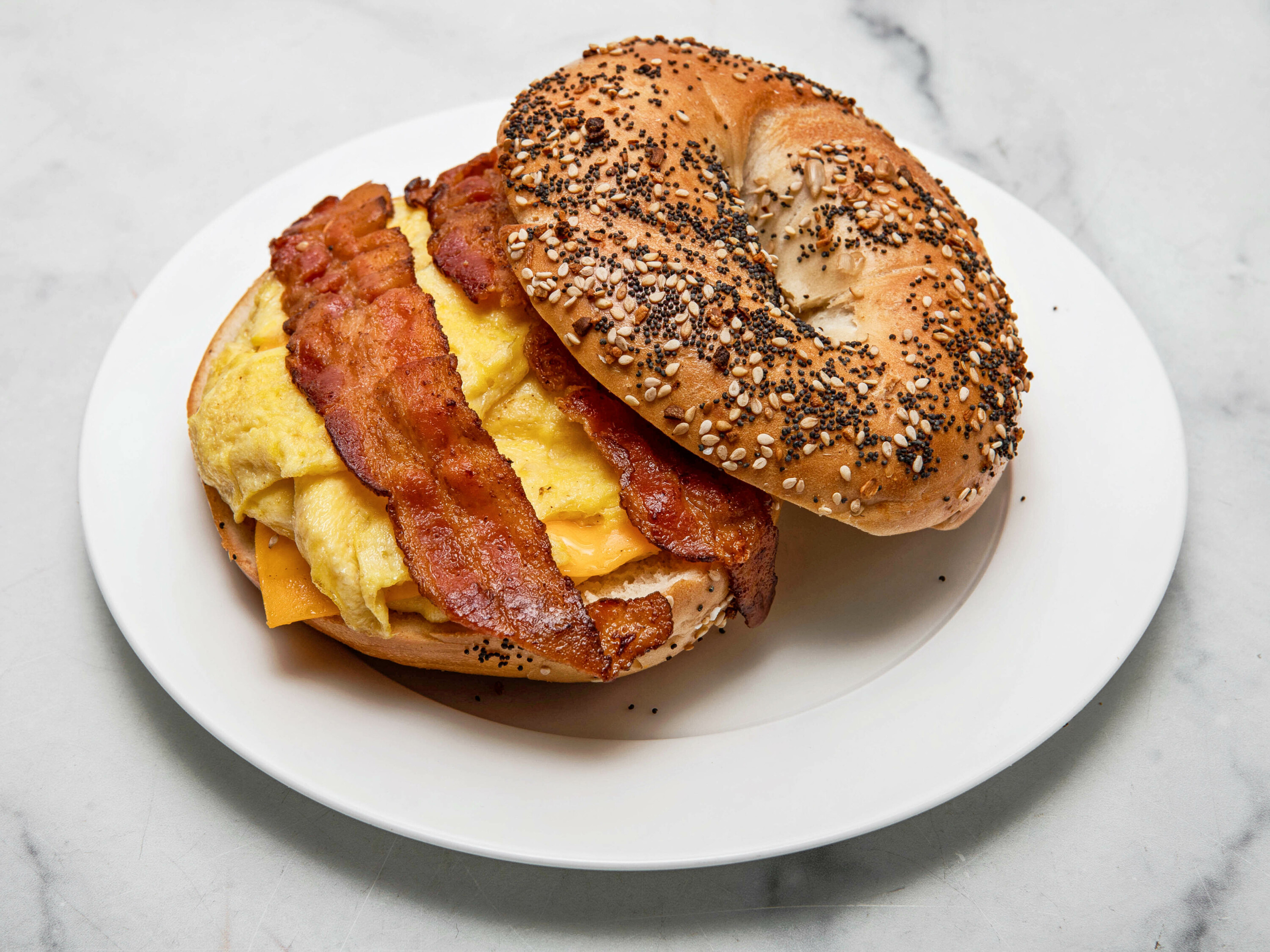 Order Bacon Eggs Cheese 2 Eggs on a Bagel food online from Bagel Express store, Valley Stream on bringmethat.com