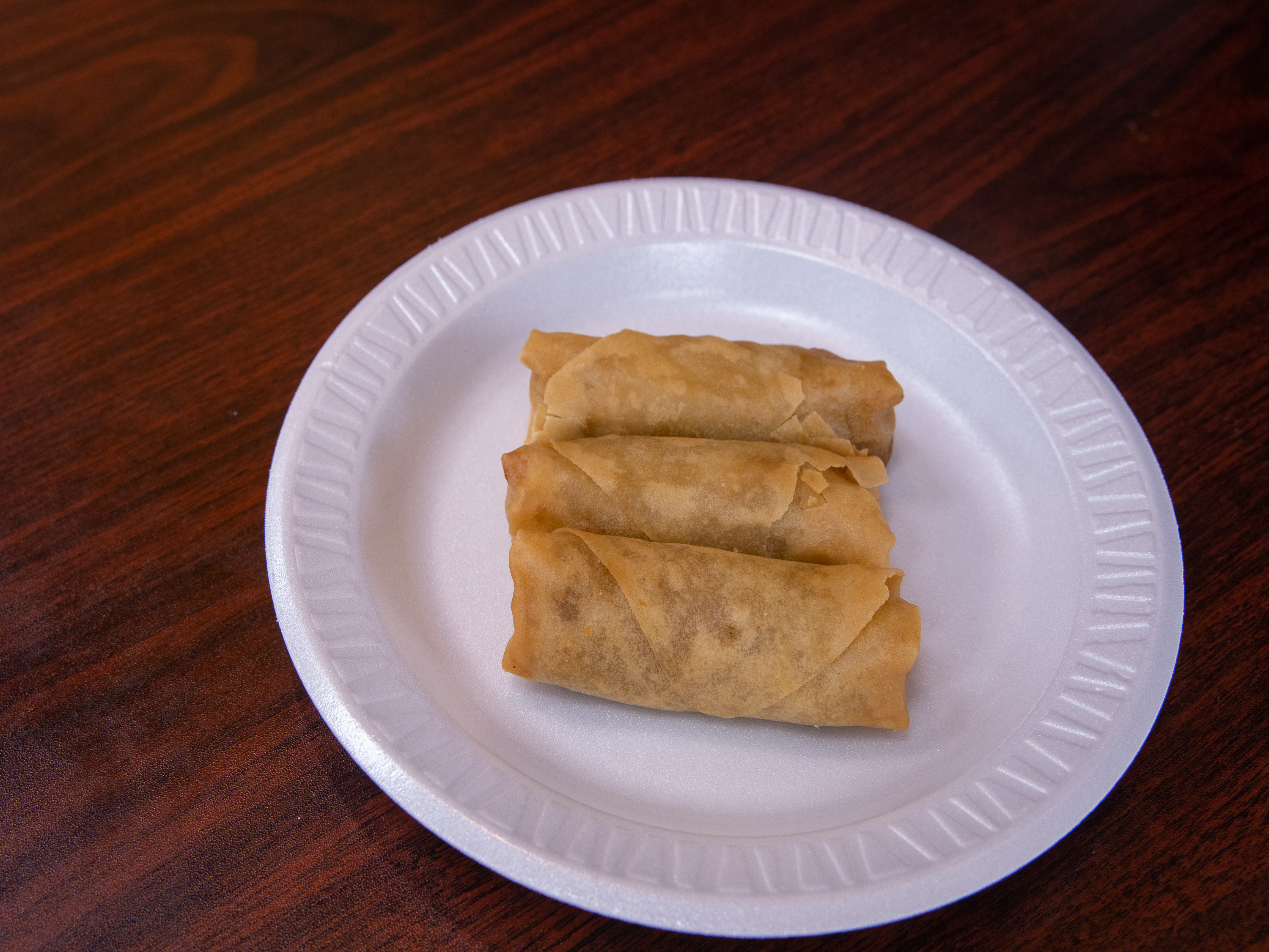 Order 2 Piece Spring Roll food online from Famous Wok store, Tomball on bringmethat.com