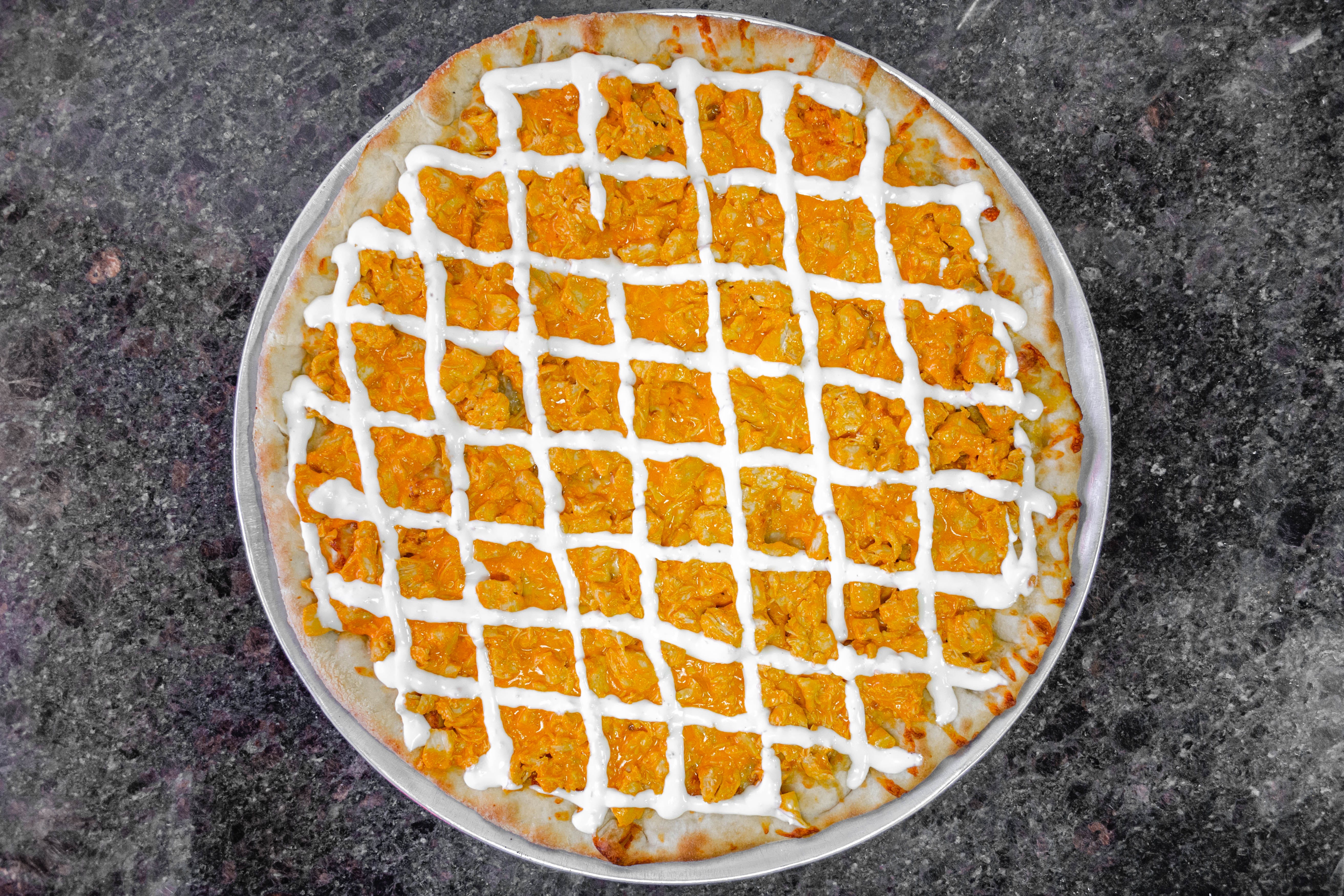 Order Buffalo Chicken Pizza - Small 14'' (6 Slices) food online from Justino's Pizza store, New York on bringmethat.com