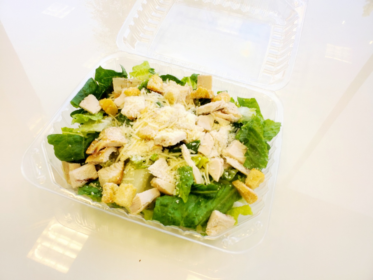 Order Chicken Caesar Salad food online from Cafe Artys II store, Newport Beach on bringmethat.com