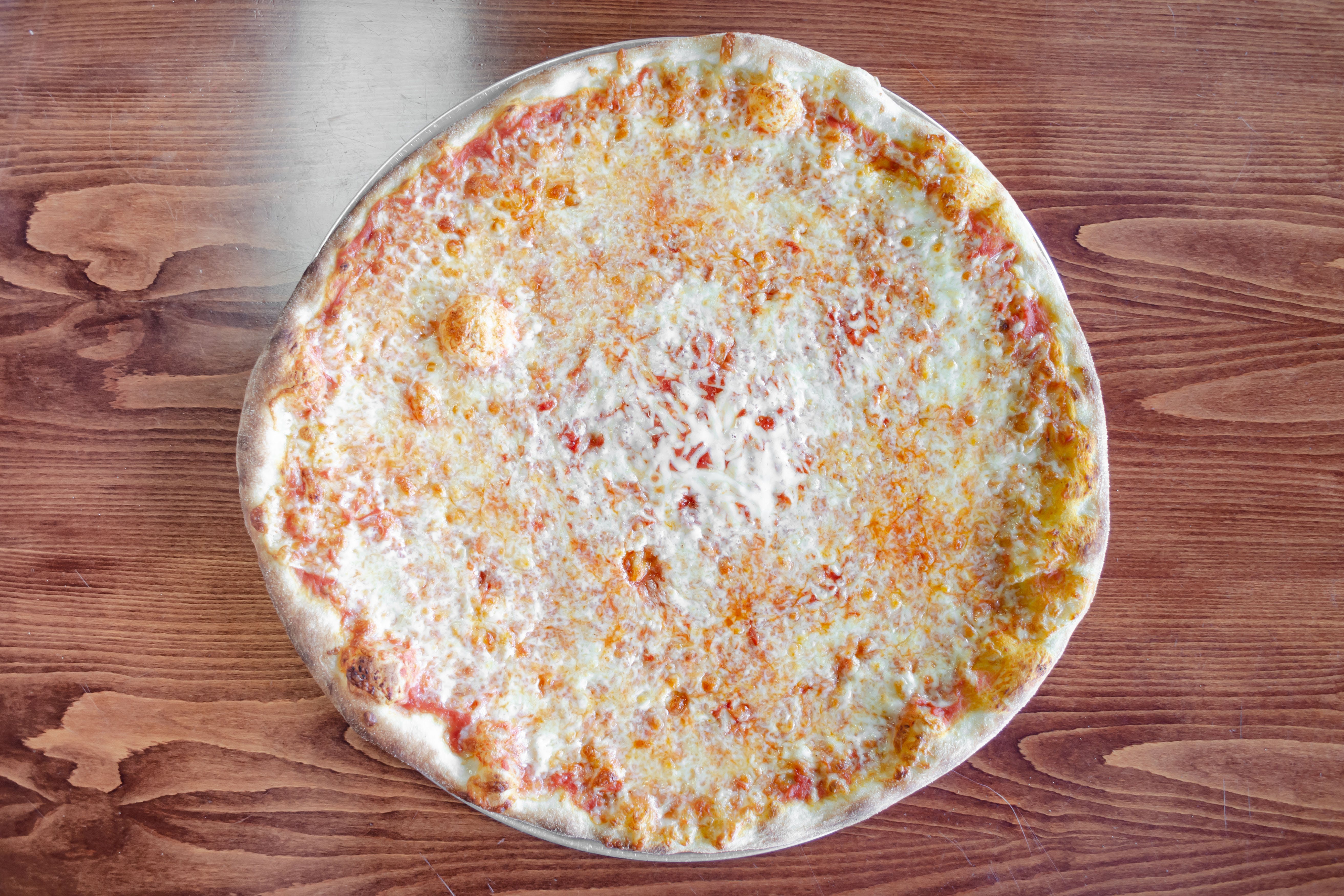 Order Plain Cheese Pizza - Small 12'' food online from Nonna Rosa Pizzeria store, Carlstadt on bringmethat.com