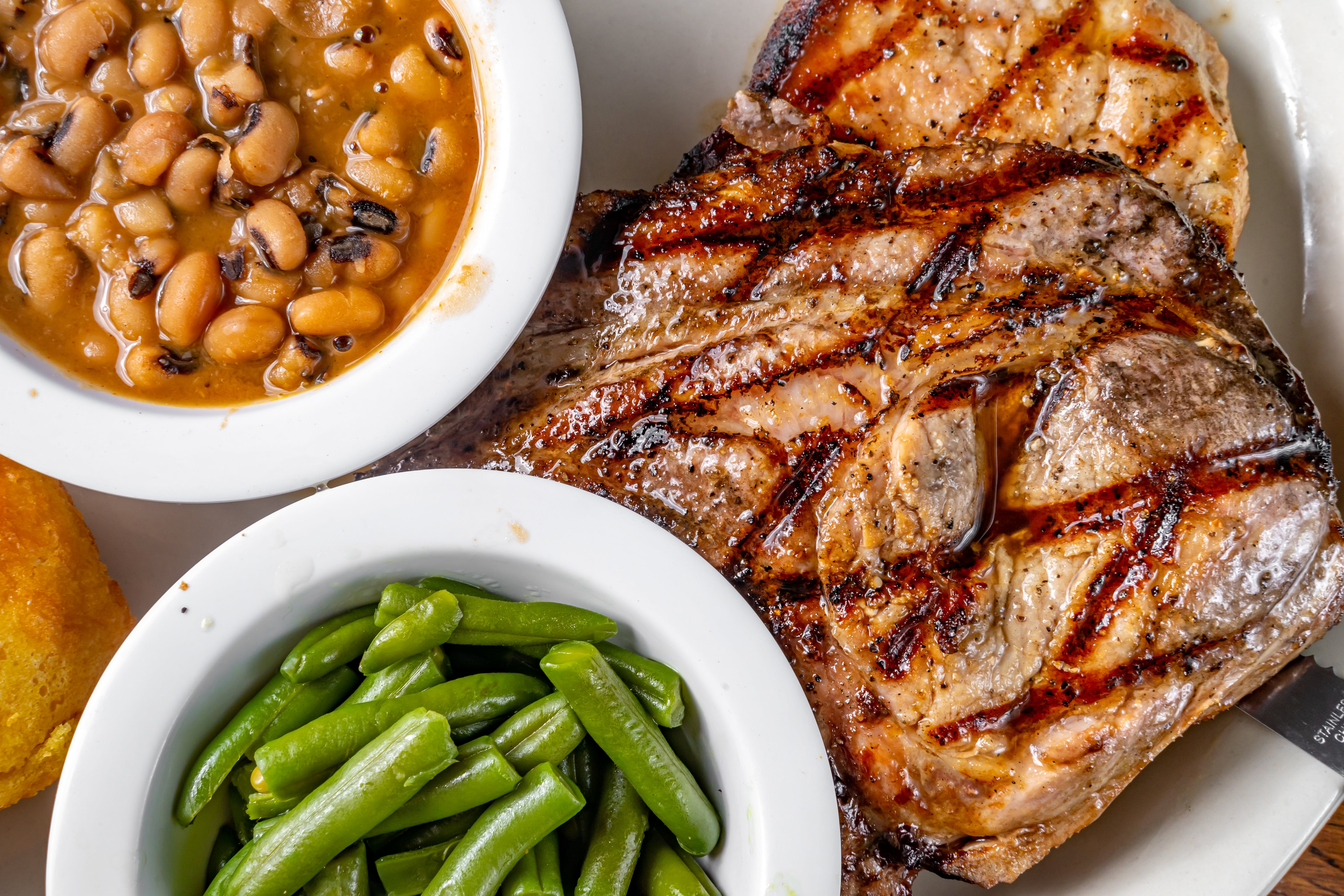 Order Grillled Pork Chops - 2 Pieces food online from Southern Recipes Grill store, Arlington on bringmethat.com