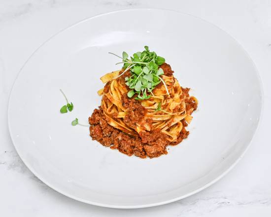 Order Tagliatelle Alla Bolognese Pasta food online from Amici At Key Biscayne store, Key Biscayne on bringmethat.com