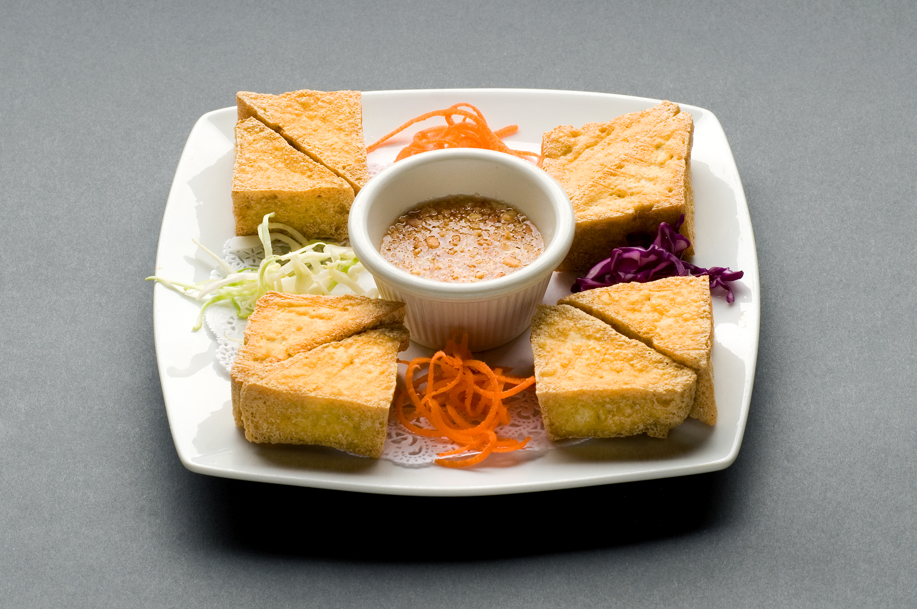 Order 3. Tofu Triangle food online from Thai Taste store, South Portland on bringmethat.com