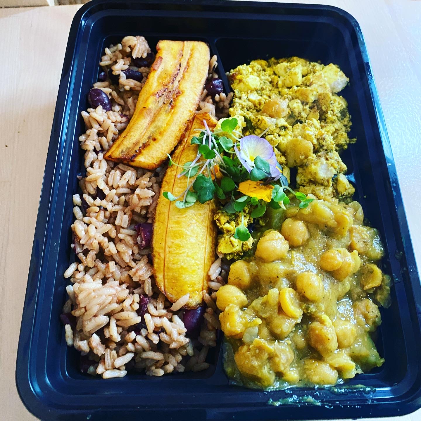 Order Curry Tofu, Potatoes and Chana with Pelau food online from Cocobreeze store, Oakland on bringmethat.com