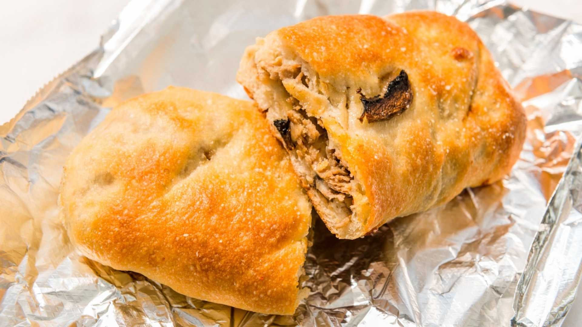 Order Mushrooms, Steak & Cheese Calzone - Calzone food online from Buscemi's store, Chesterfield on bringmethat.com