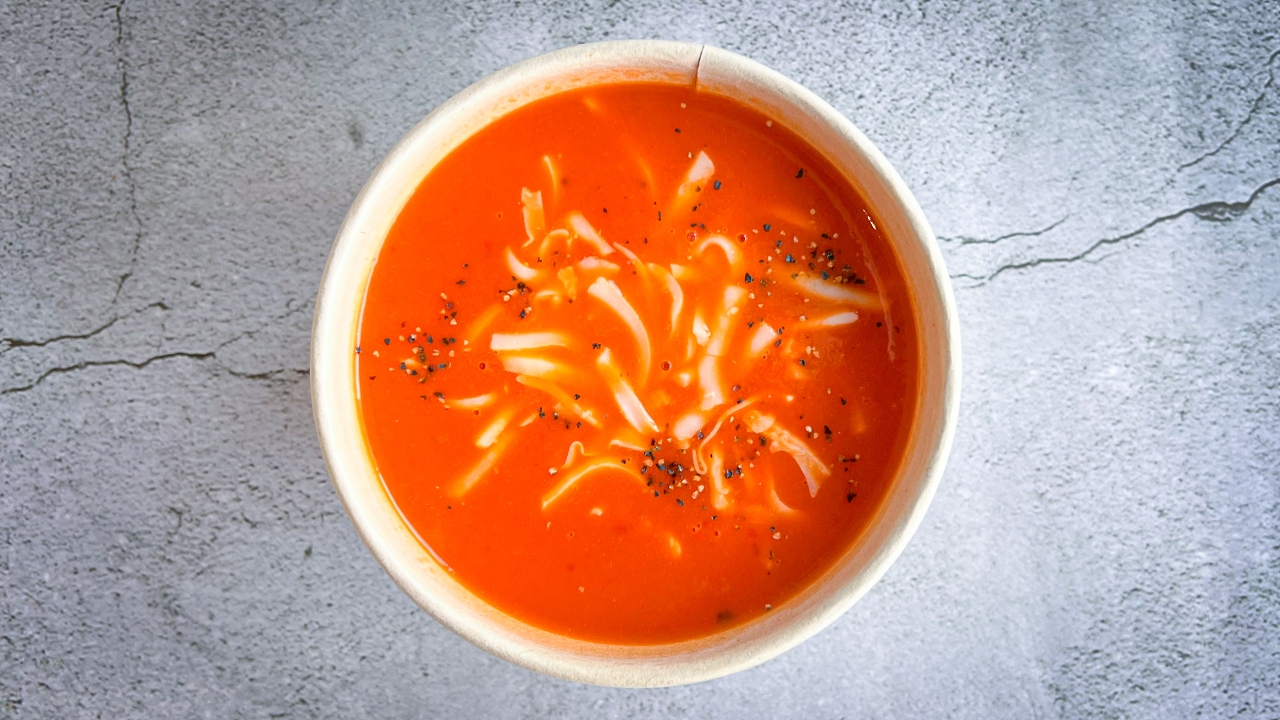 Order Tomato and Roasted Red Bell Pepper Soup food online from Soupchu store, San Francisco on bringmethat.com