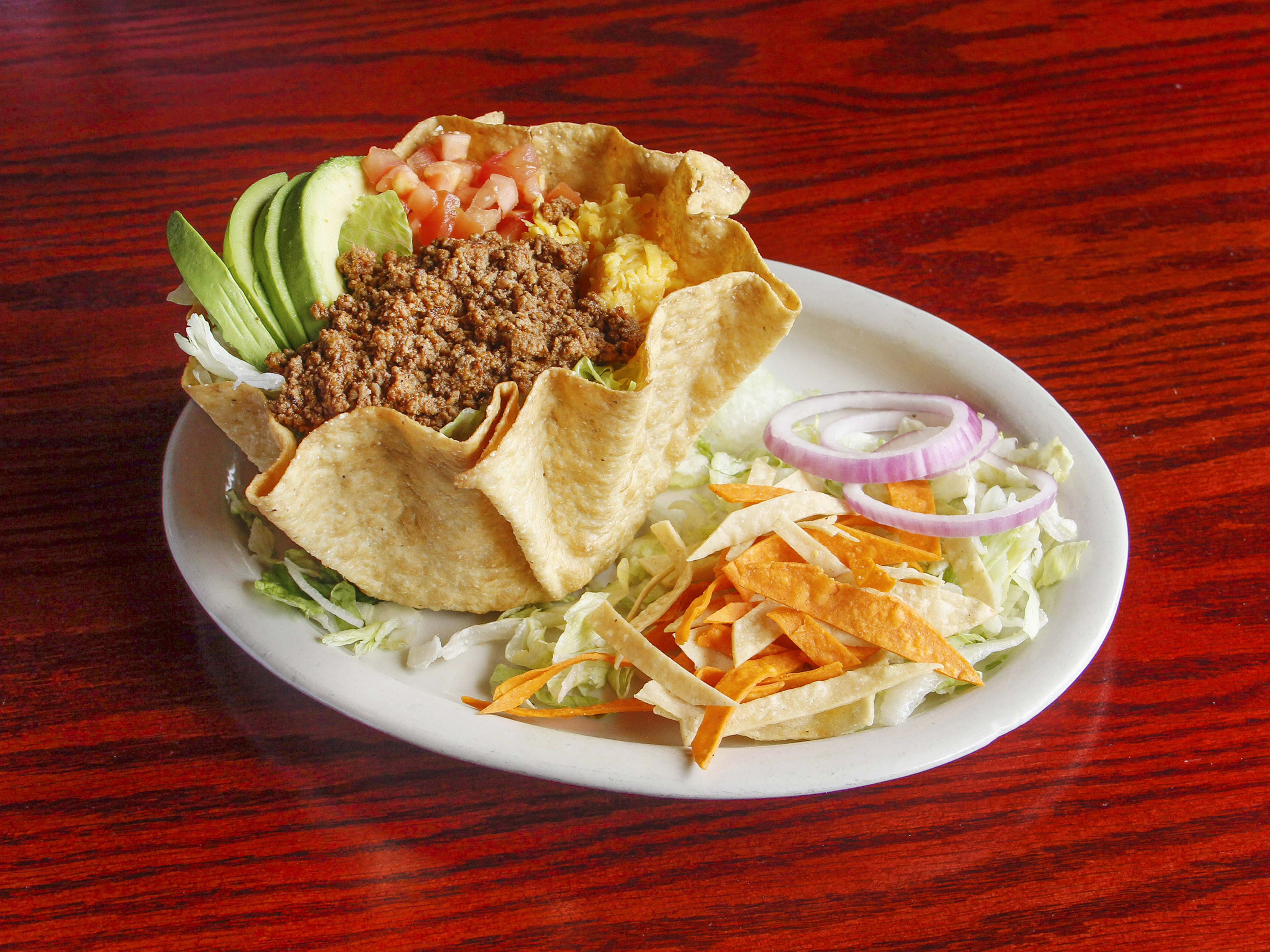 Order Fiesta Salad food online from Cilantro Mexican Grill store, Kingwood on bringmethat.com