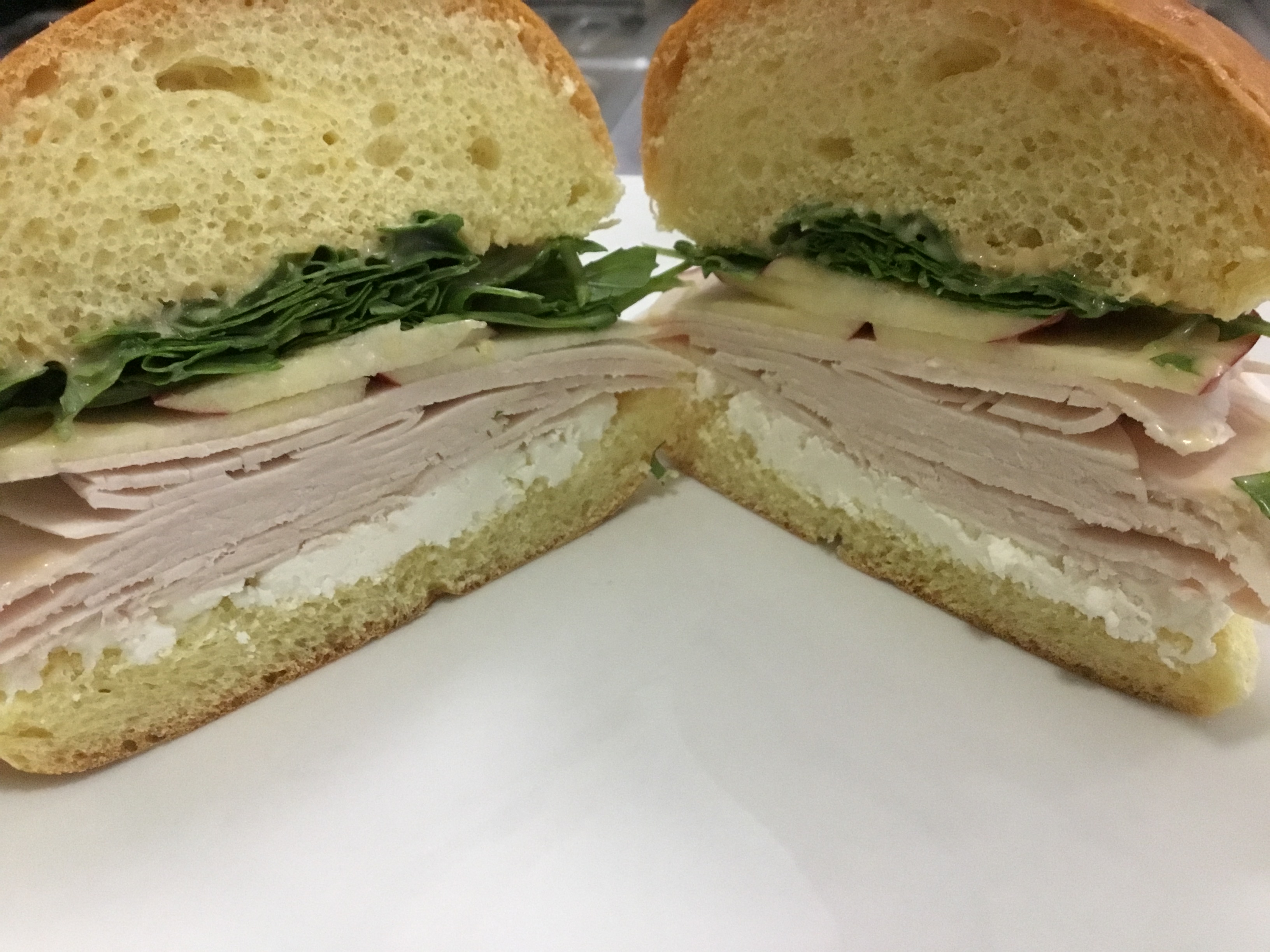Order Turkey and Goat Cheese Sandwich food online from J Cafe store, Pelham on bringmethat.com