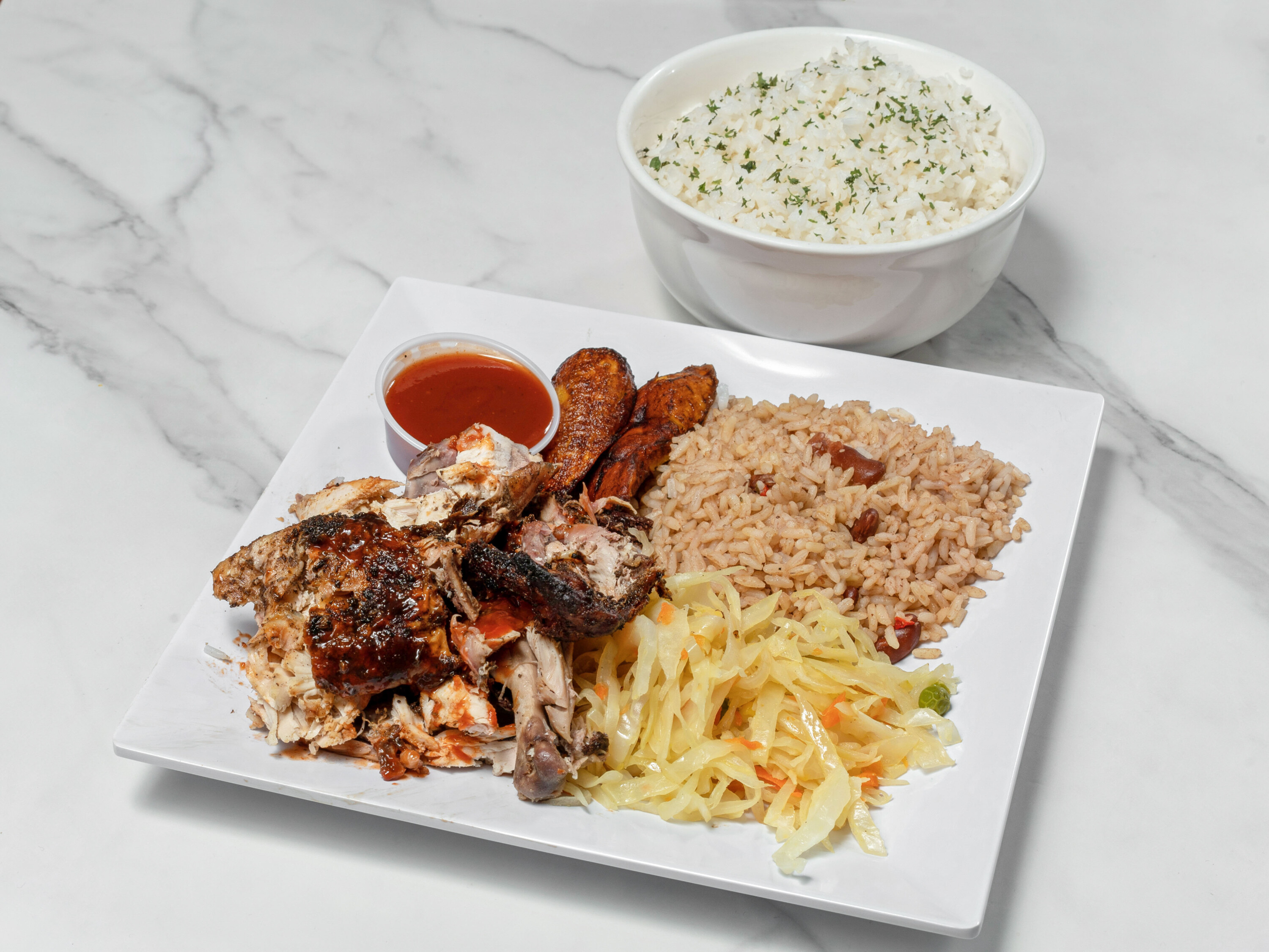 Order Jerk Chicken food online from Culcha Caribbean Cuisine store, Haledon on bringmethat.com