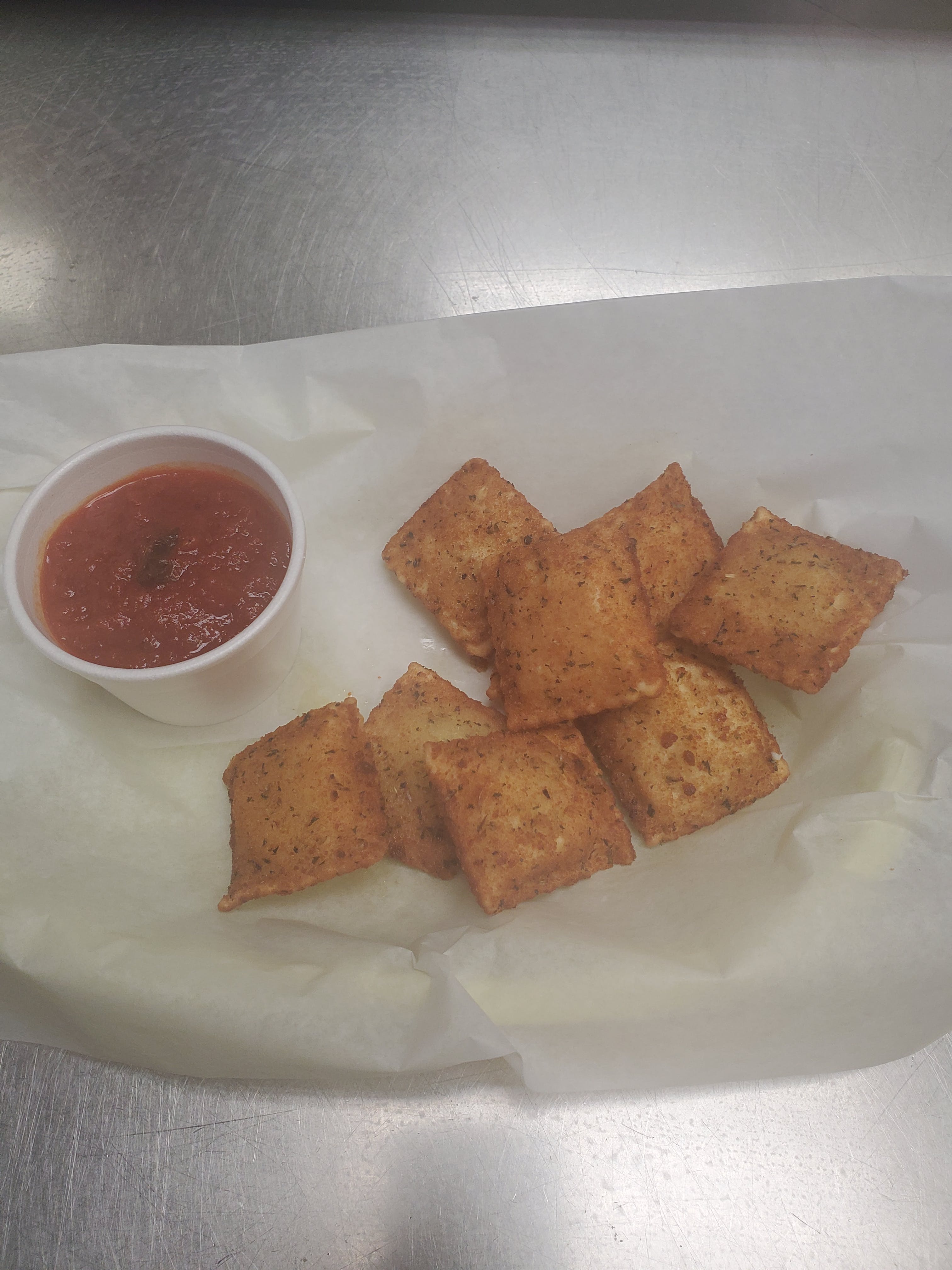 Order Fried Cheese Ravioli - Appetizer food online from Pizza Cucina store, Oswego on bringmethat.com