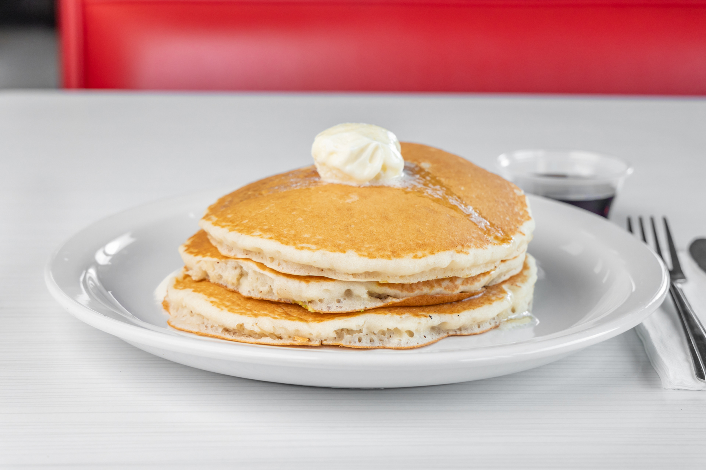 Order 5. Three Hot Cakes Stack food online from Goody Cafe store, Palm Desert on bringmethat.com