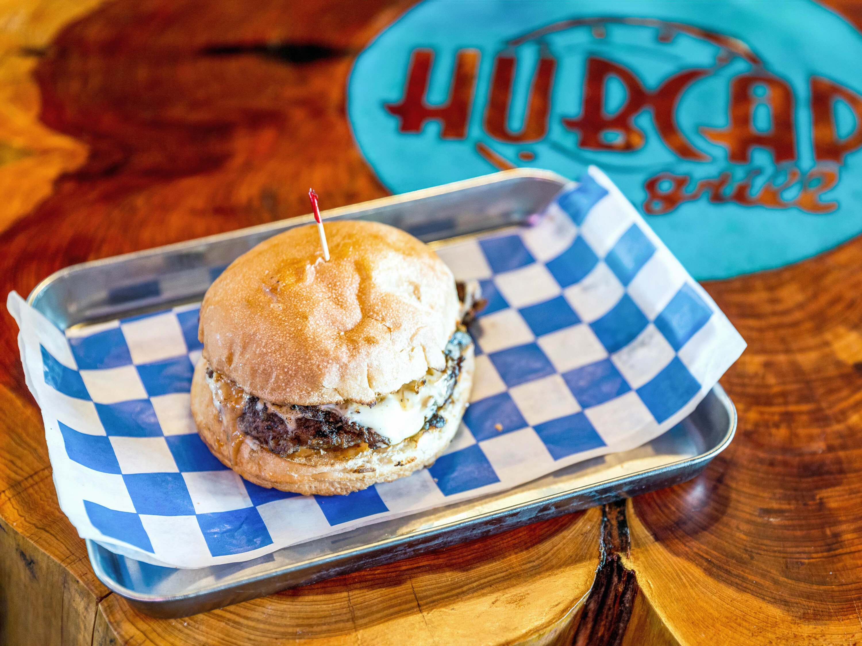 Order Philly Cheese Steak Burger food online from Hubcap Grill store, Galveston on bringmethat.com