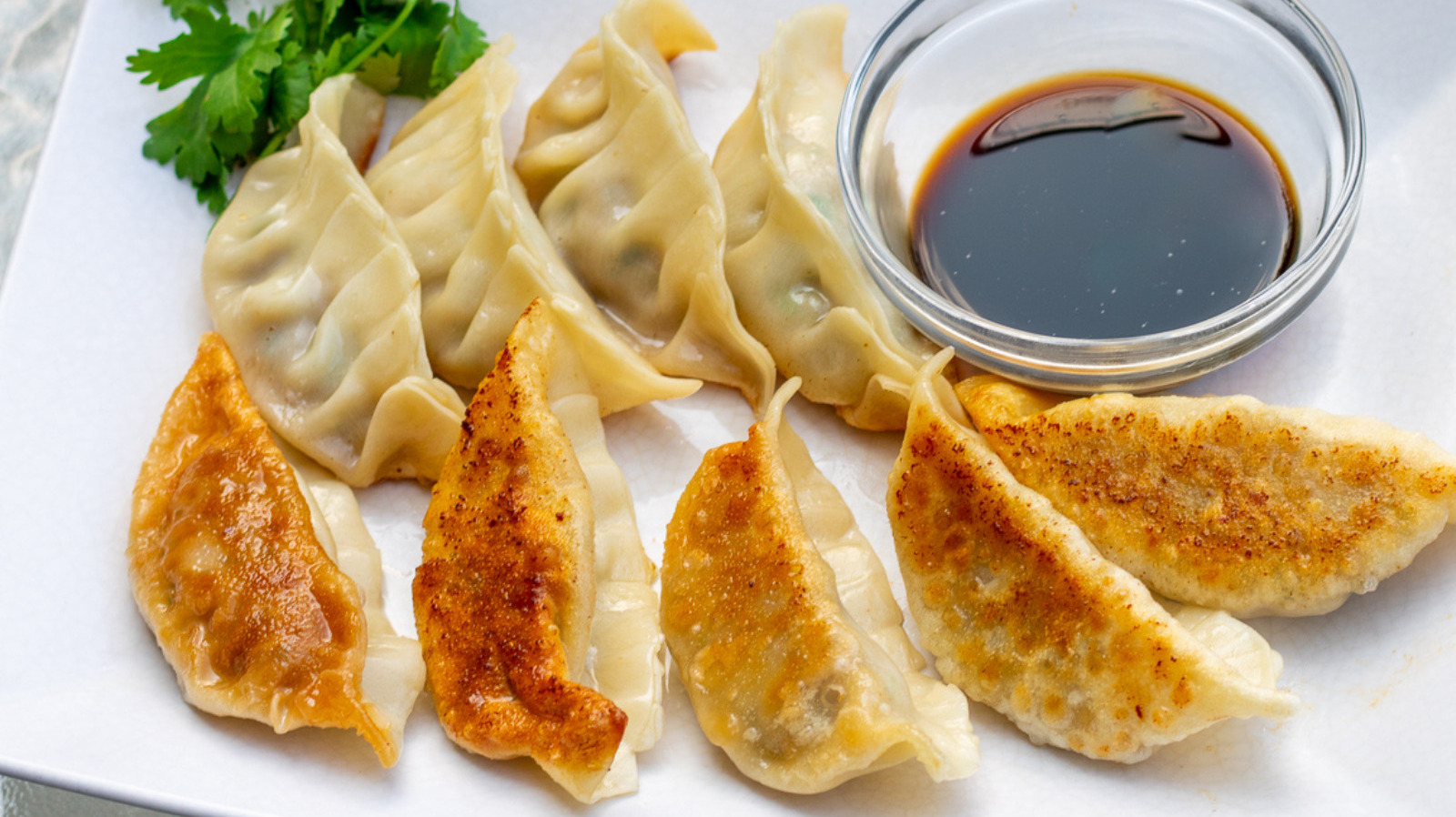 Order Pork Gyoza food online from Fushimi Sushi & Seafood Buffet (All-You-Can-Eat) store, Milwaukee on bringmethat.com